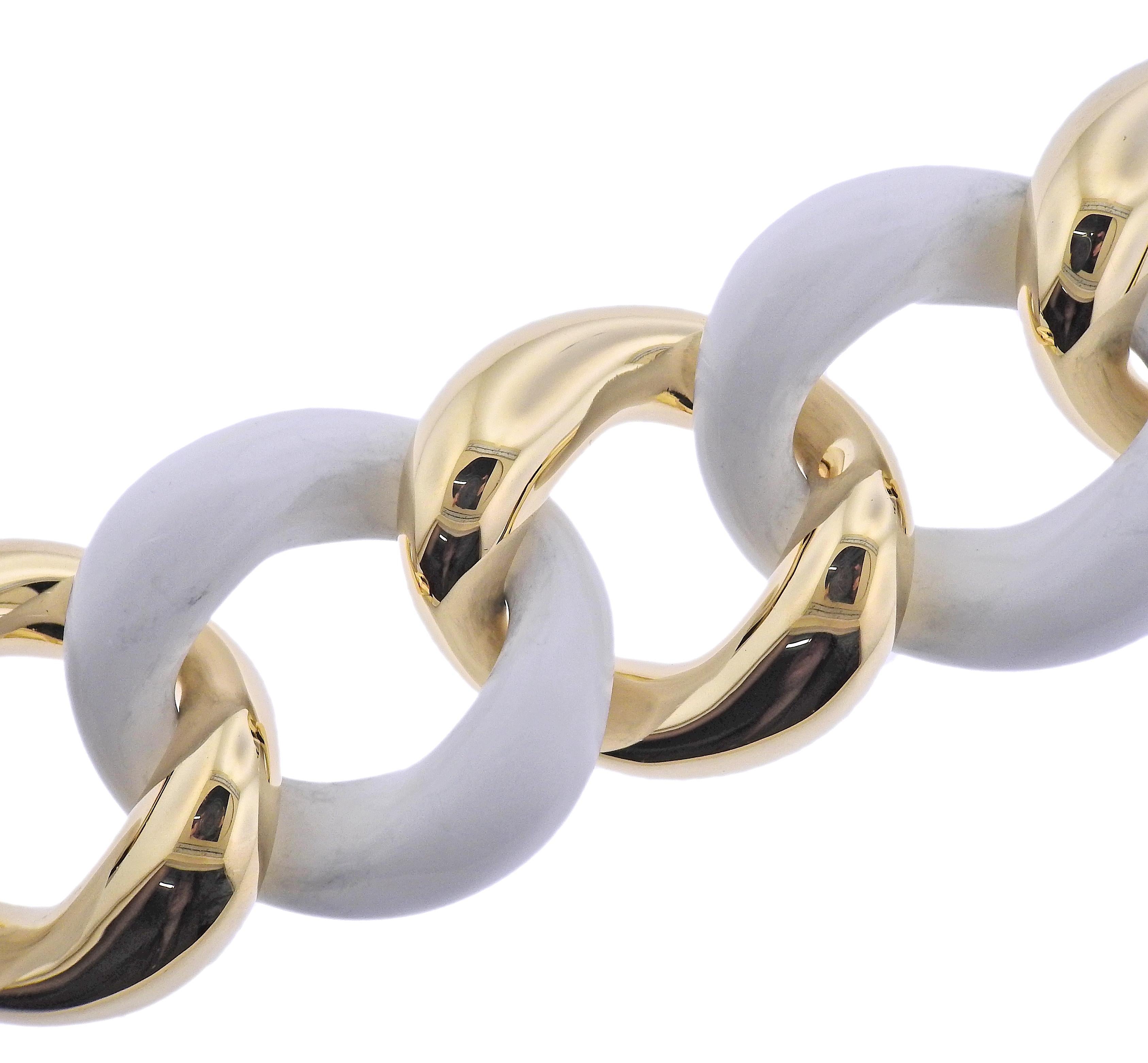 Brand new Seaman Schepps large link bracelet in 18k gold with white ceramic. Comes with box. Bracelet is 7.75