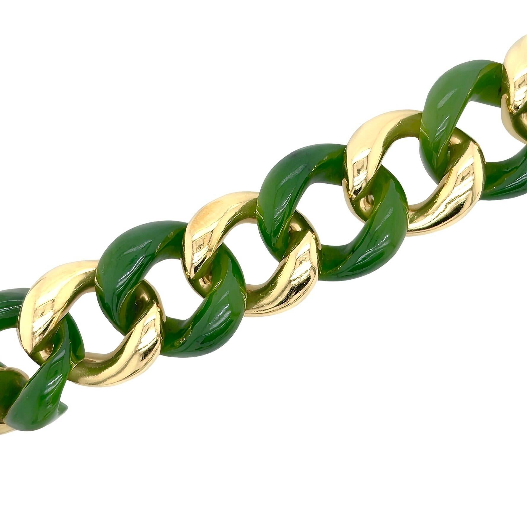 An 18 karat yellow gold and nephrite bracelet, Seaman Schepps.  Designed as a large link bracelet of alternating nephrite and gold curb links.  Length approximately 8 inches.  Gross weight approximately 123.30 grams.  Signed Seaman Schepps with