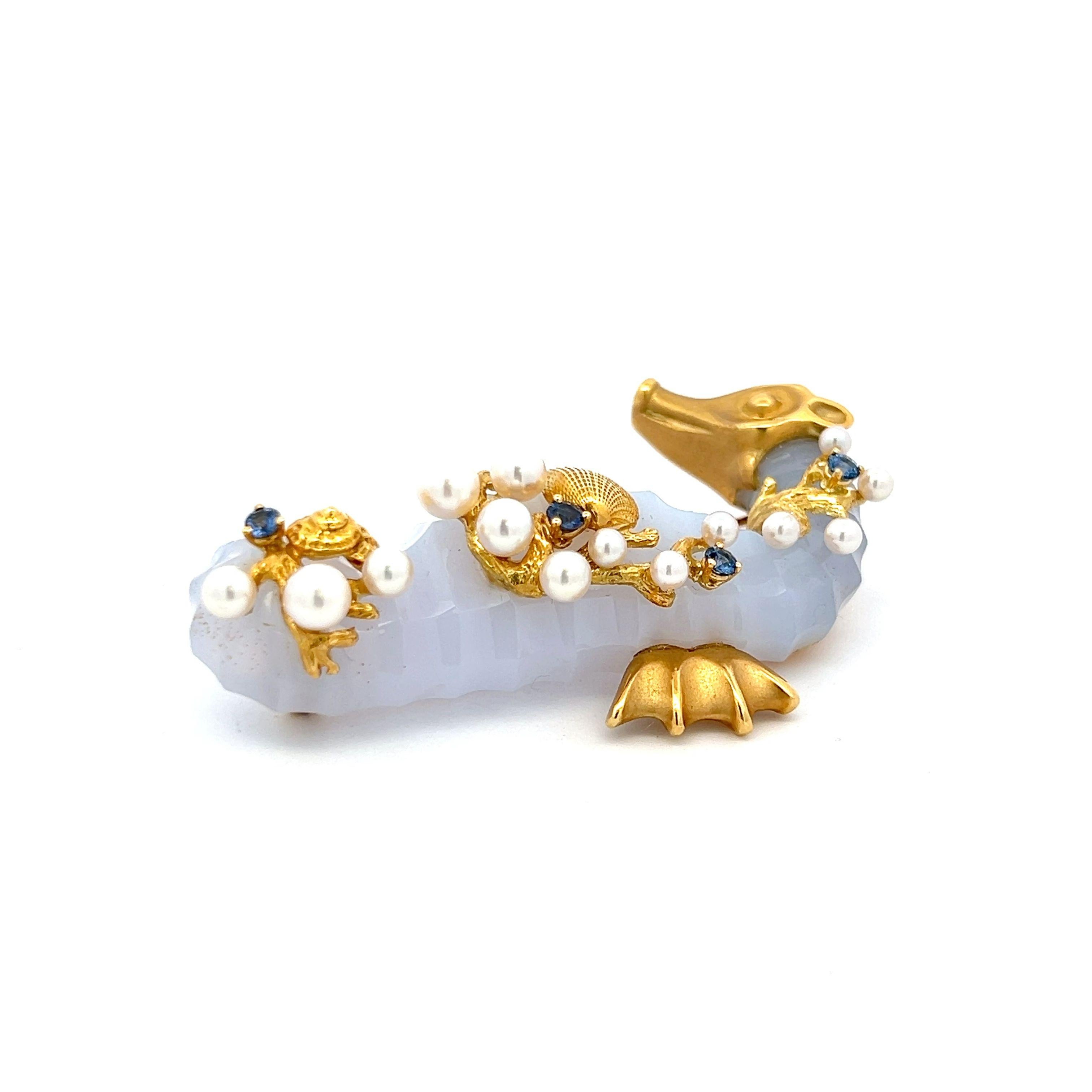Designer:
SEAMAN SCHEPPS
Title:
Seaman Schepps 1.00 Carat Pearl 0.40 Carat Round Brilliant Sapphire 18 Karat Yellow Gold Pin Brooch
Style:
Pin
Metal:
18 Karat Yellow Gold
Gemstone 1:
1 Carat PEAR
Number of Stones:
13
Gemstone 2:
0.4 Carat