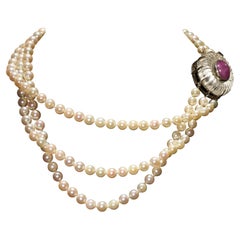 Seaman Schepps pearl necklace, with ruby and rock crystal clasp