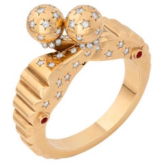 Brazalete retro Seaman Schepps de oro, diamantes y rubíes