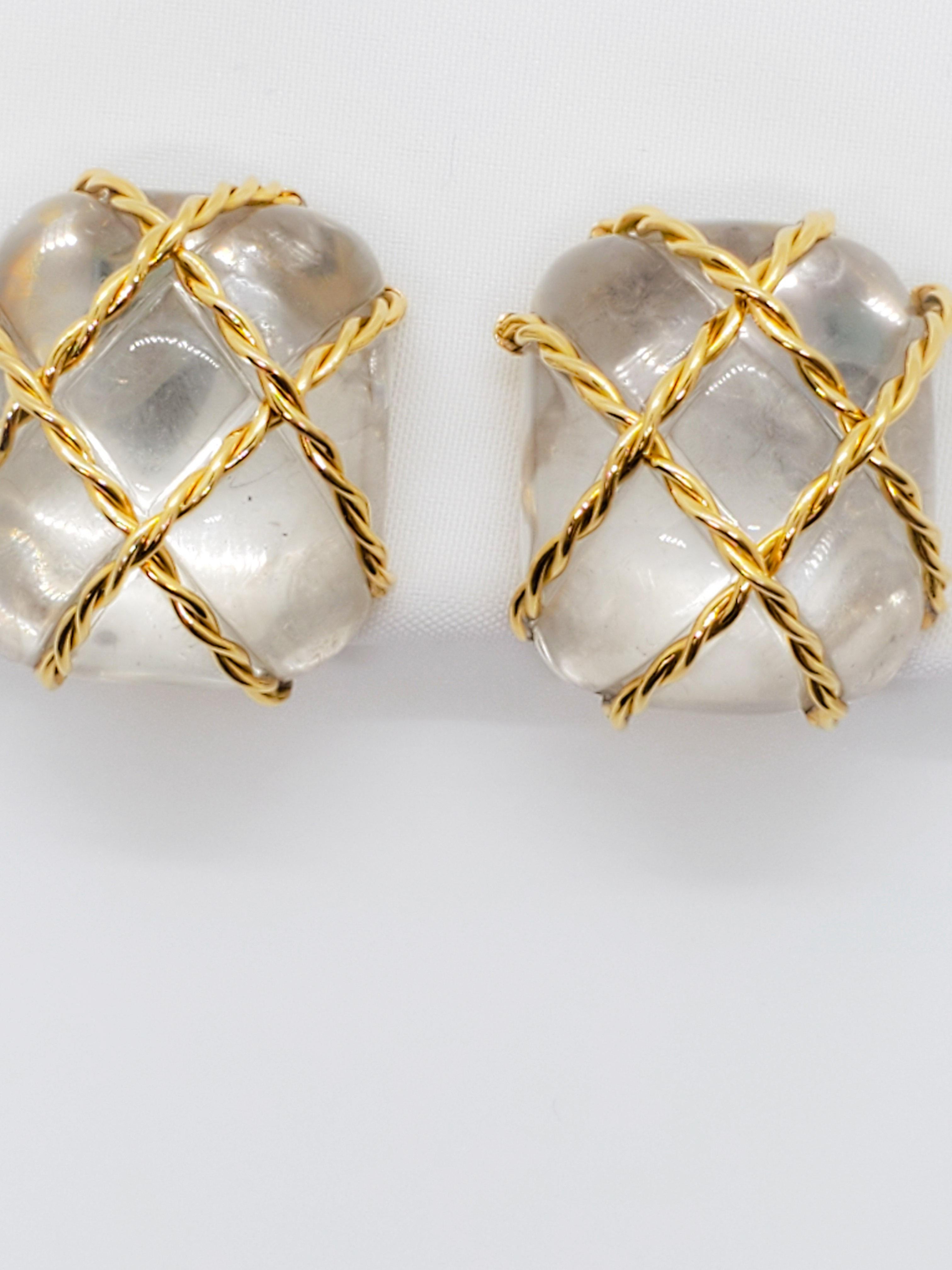 Gorgeous authentic rock crystal earrings by Seaman Schepps with a classic criss cross gold design.  Clip on.  18k Yellow Gold.