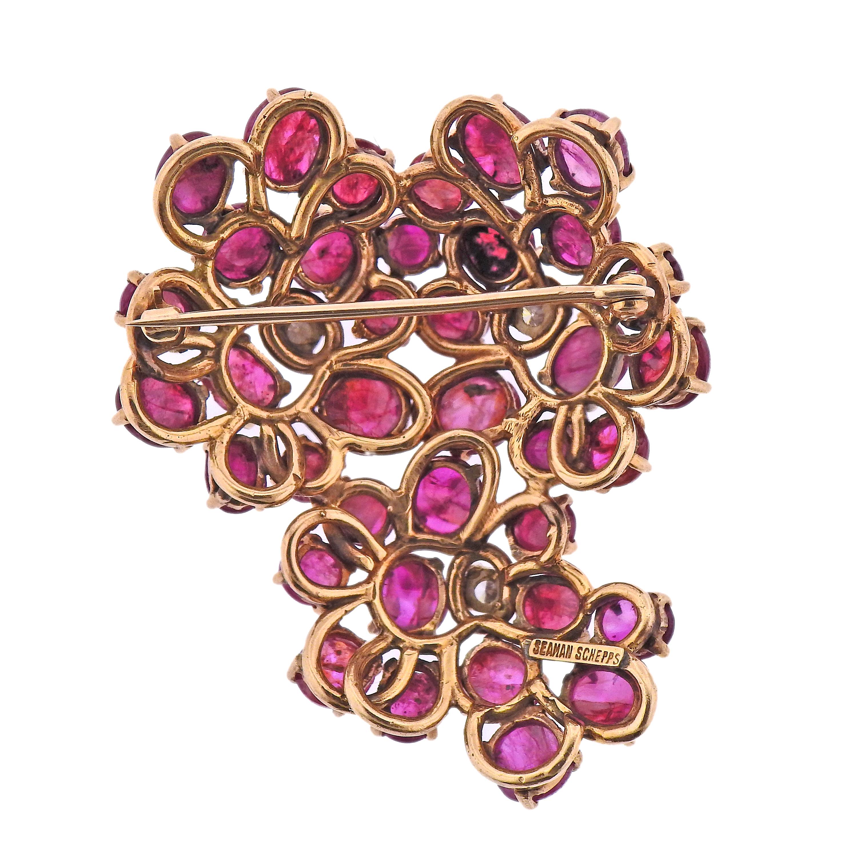 Vintage 14k gold brooch by Seaman Schepps, with three diamonds - approx. 0.45ctw and ruby cabochons (multiple stones have chips). Brooch measures 2.25