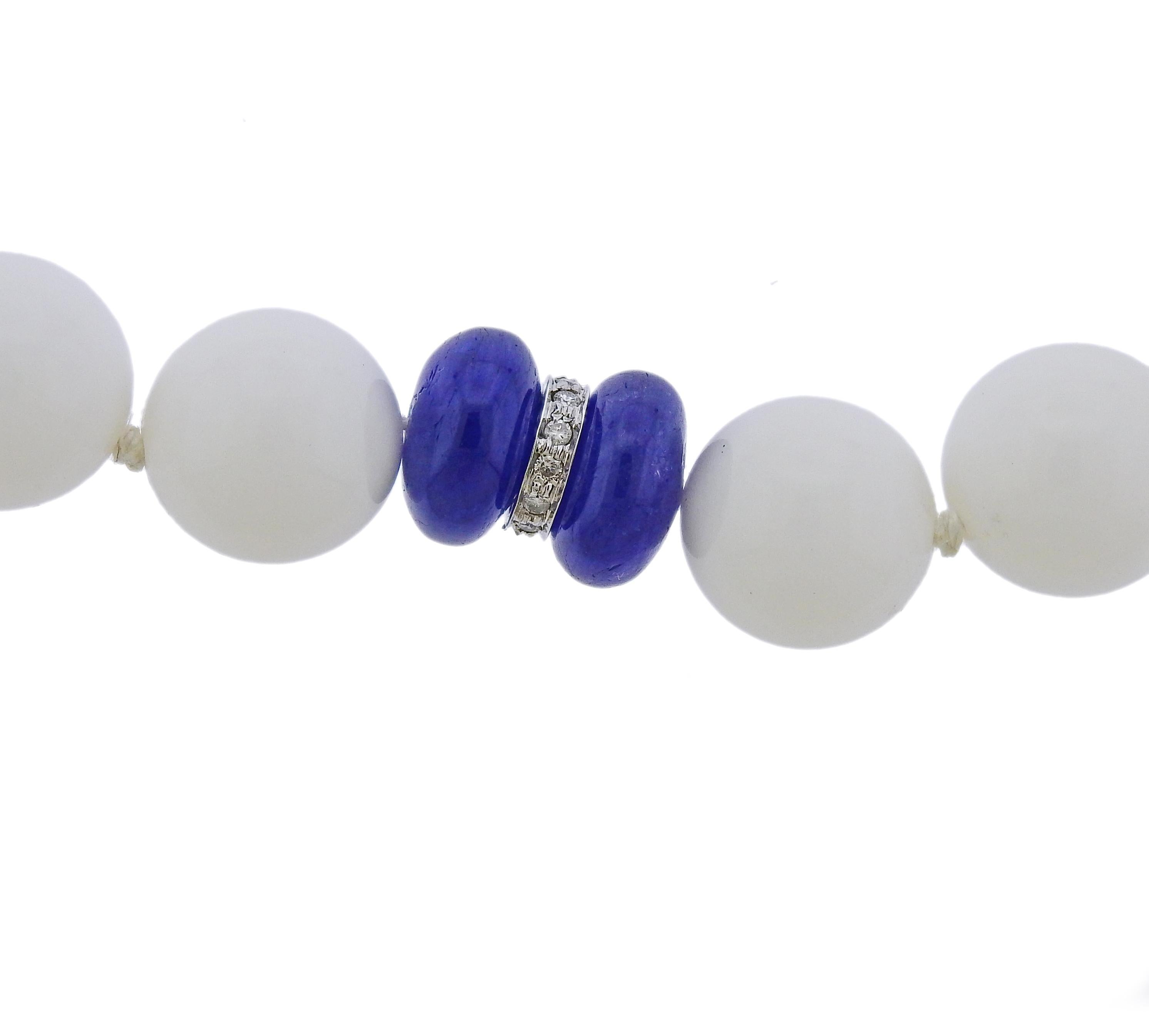 Seaman Schepps 18k white gold necklace with 12mm to 12.3mm white agate beads and 8mm x12mm sapphire diamond spacers. Necklace is 16.5