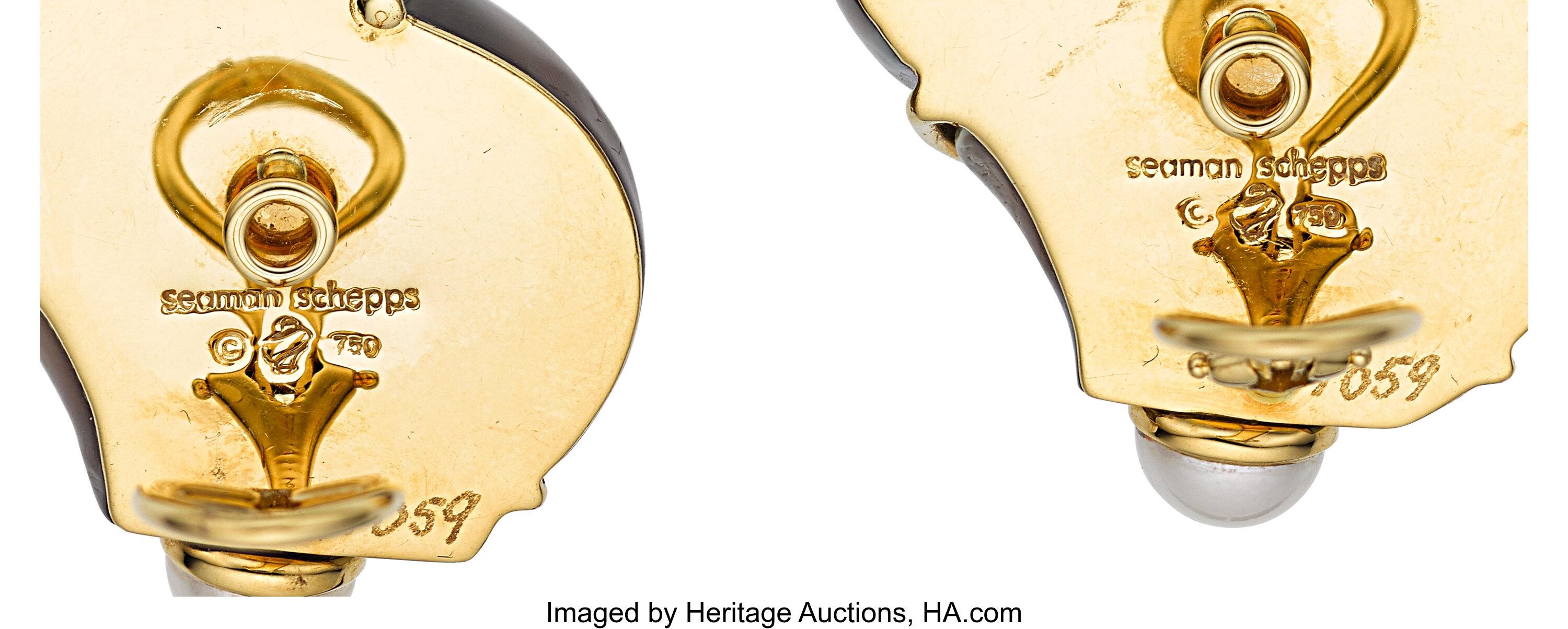 Gorgeous Turbo Shell Earrings with Half-Pearl Terminals
Marked Seaman Schepps
Feature Turbo Shell and Akoya Pearl in 14k Yellow Gold Setting
Length of Earrings = 1-1/2