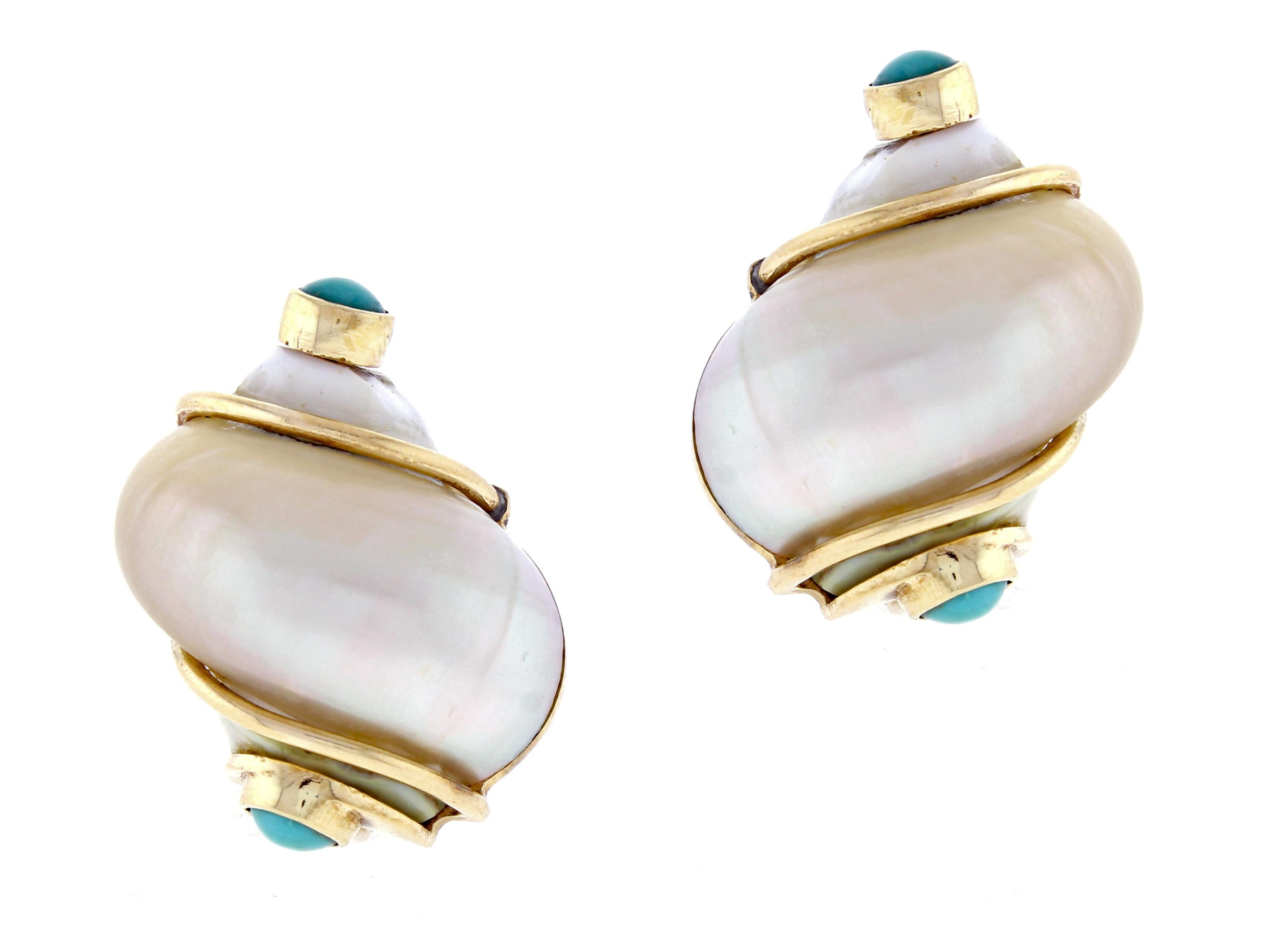  From Seaman Scheps, a pair of 14 karat yellow gold, turbo shell and coral earrings. . Each set with a white turbo shell, terminating in a cabochon turquoise accented by gold wire. 29mm high
