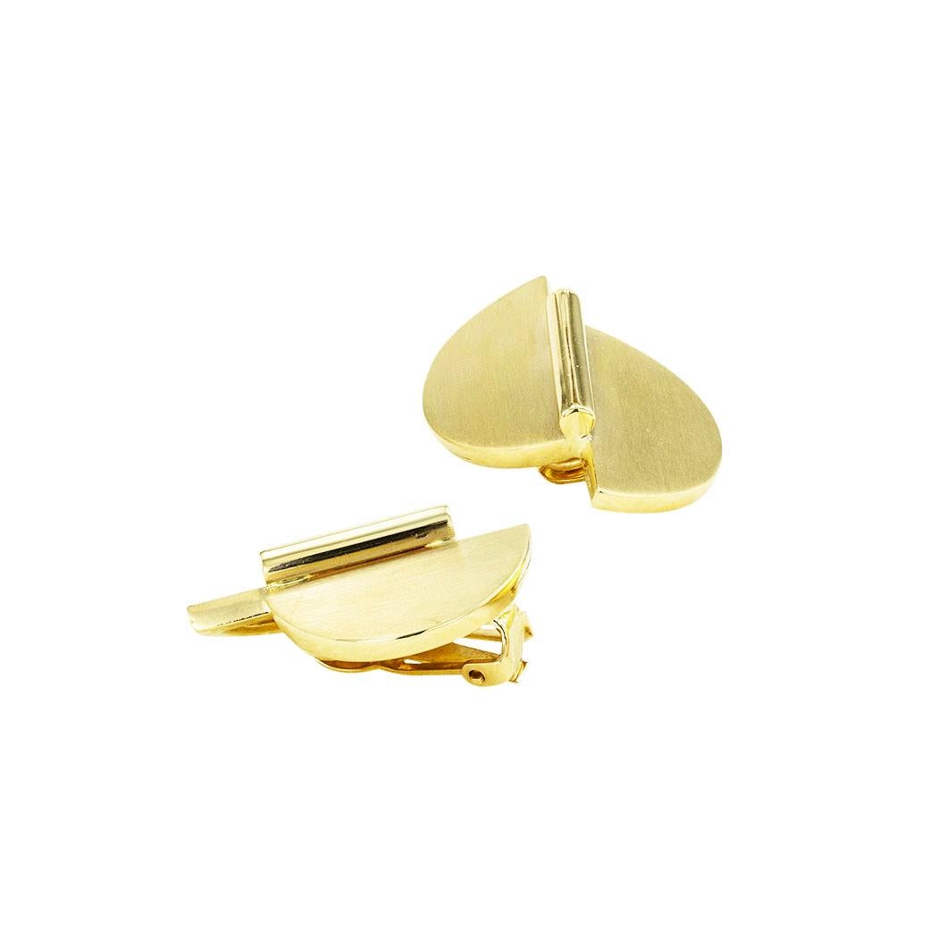 Seaman Schepps yellow gold clip-on earrings circa 1950. 

ABOUT THIS ITEM:  #E-DJ68I. Scroll down for specifications.  Isn’t this a fabulous design?  There is so much geometry, so much simplicity.  All of it translates into high class on a scale