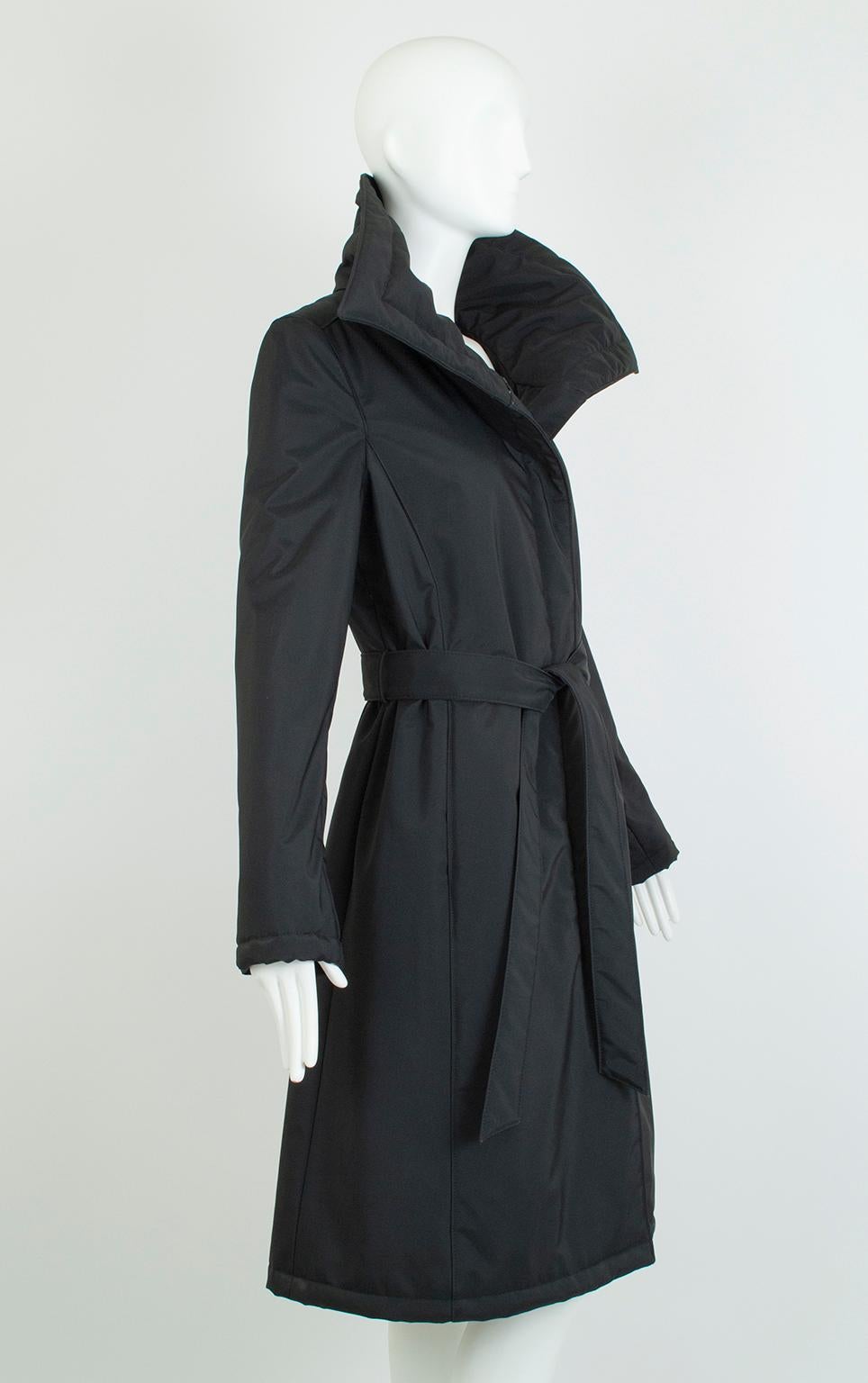 Looking smart and staying warm need not be mutually exclusive. To wit, this Searle princess seam trench coat combines sleek, elegant lines with the warmth and water-resistance of a down coat twice its size. Its massive portrait collar may be worn