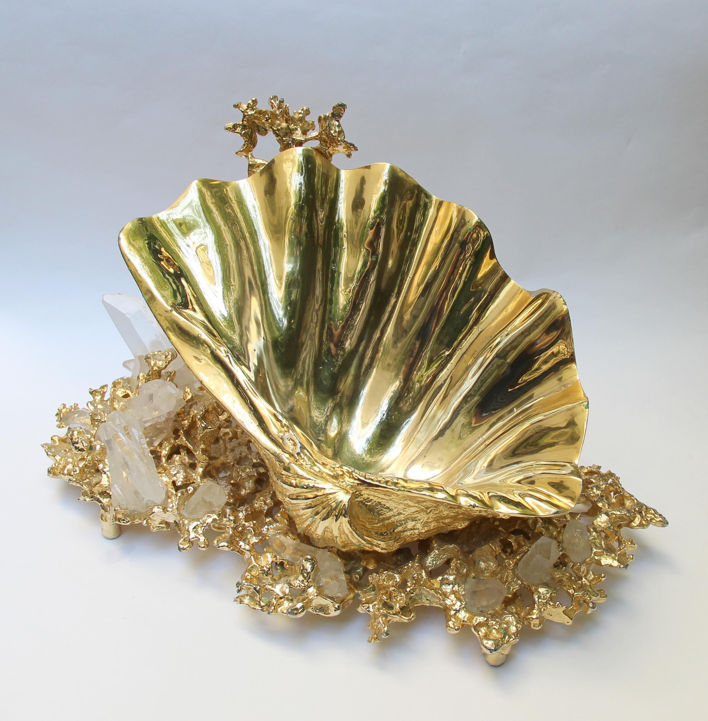 Seashell, bag holder or centerpiece in gilded bronze and rock crystals.

Biography

Claude Victor Boeltz, France (1937)

Claude-Victor Boeltz, is born in 1937 in Paris. Complete artist (sculpture, painting, foundry, pottery, ironwork), « meilleur