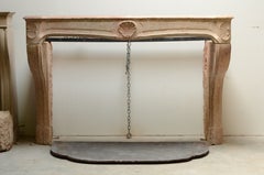 Seashell Decorated Antique French Limestone Louis XV Fireplace Mantel
