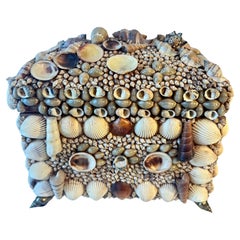 Seashell Encrusted Lidded Box with Feet and Handles of Brass Seashells