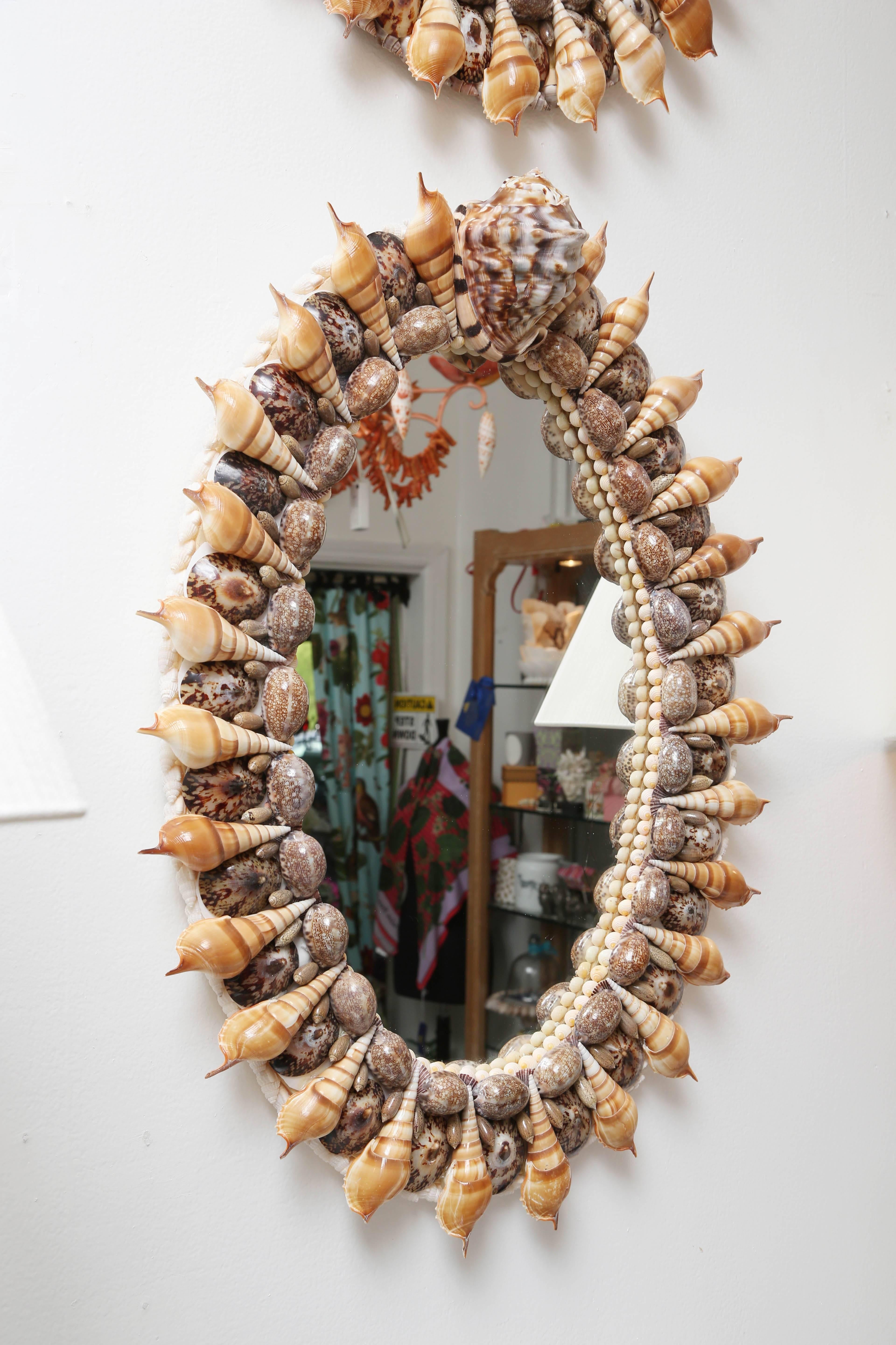 Handcrafted, unique shell encrusted mirror featuring top grade seashells. Meticulously, designed by
artist with over thirty years of experience.