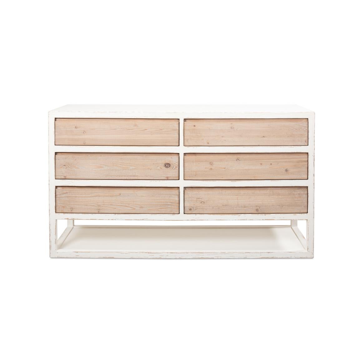 This piece celebrates the simplicity and warmth of rustic design, featuring a white-washed finish that evokes the feel of sun-bleached shores. Crafted with natural reclaimed fir wood drawers, each with its unique grain and character, it offers ample