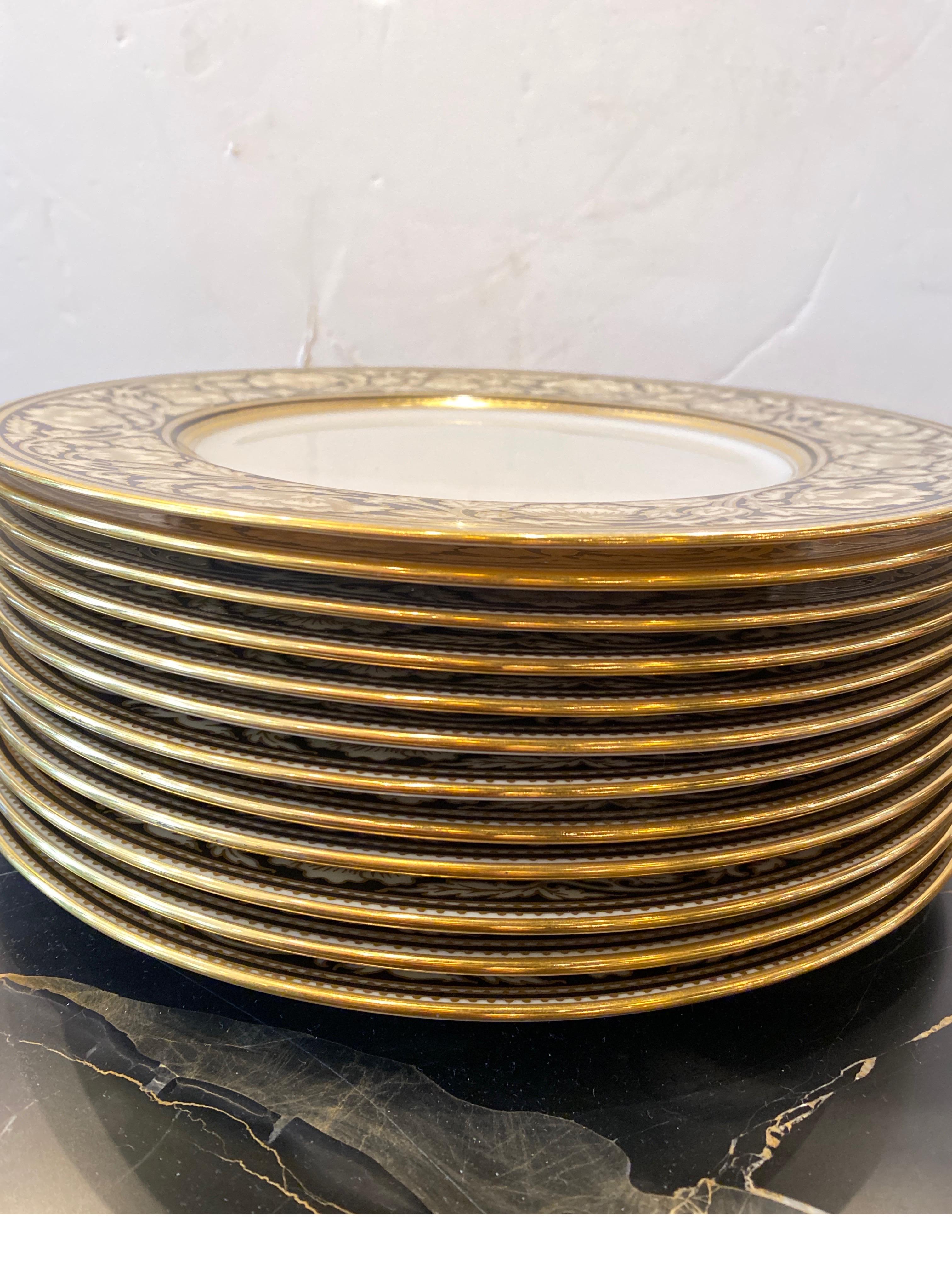 Early 20th Century Set of 12 Elaborate Black and Gilt Service Place 1920's For Sale