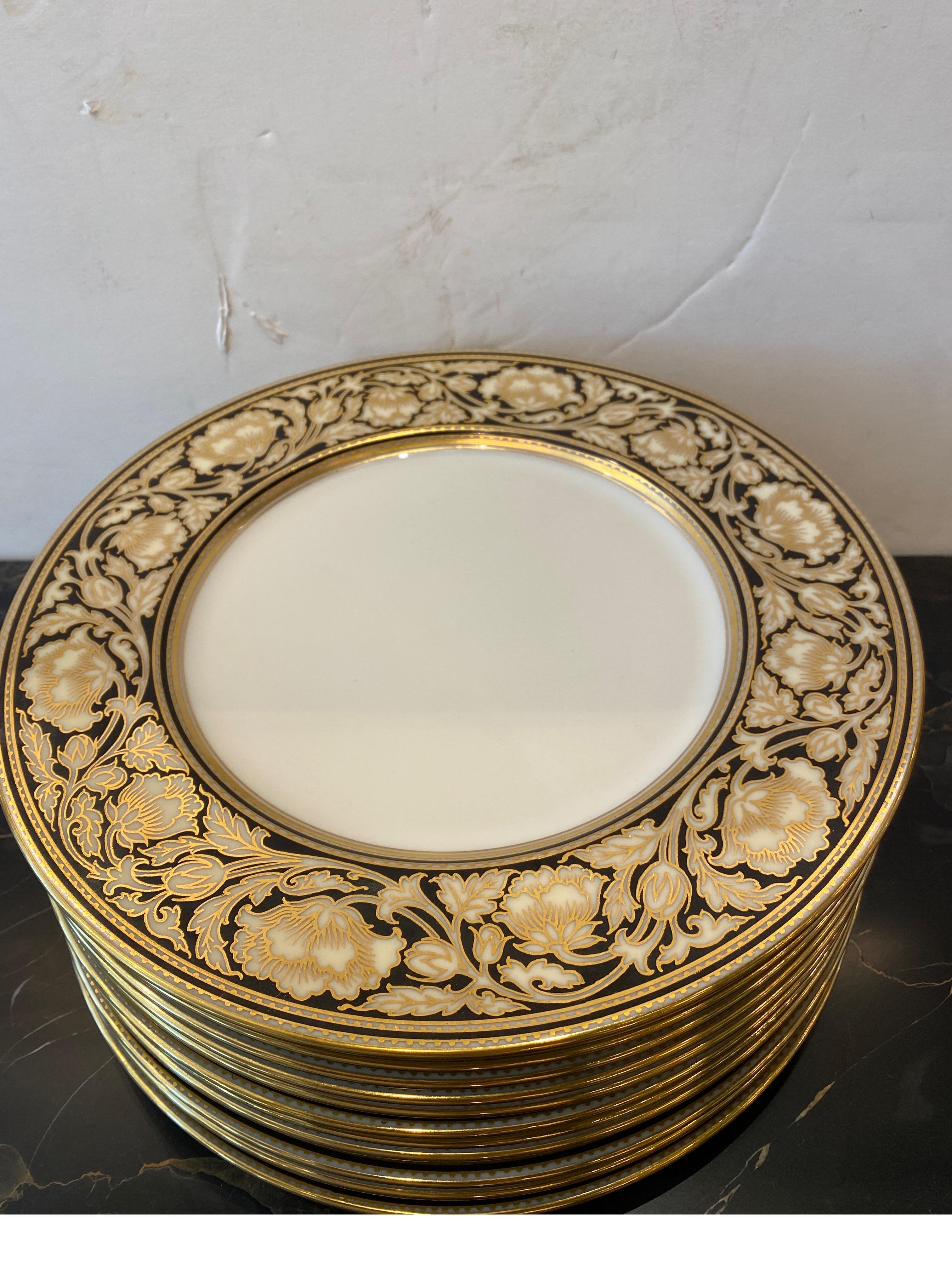 Porcelain Set of 12 Elaborate Black and Gilt Service Place 1920's For Sale