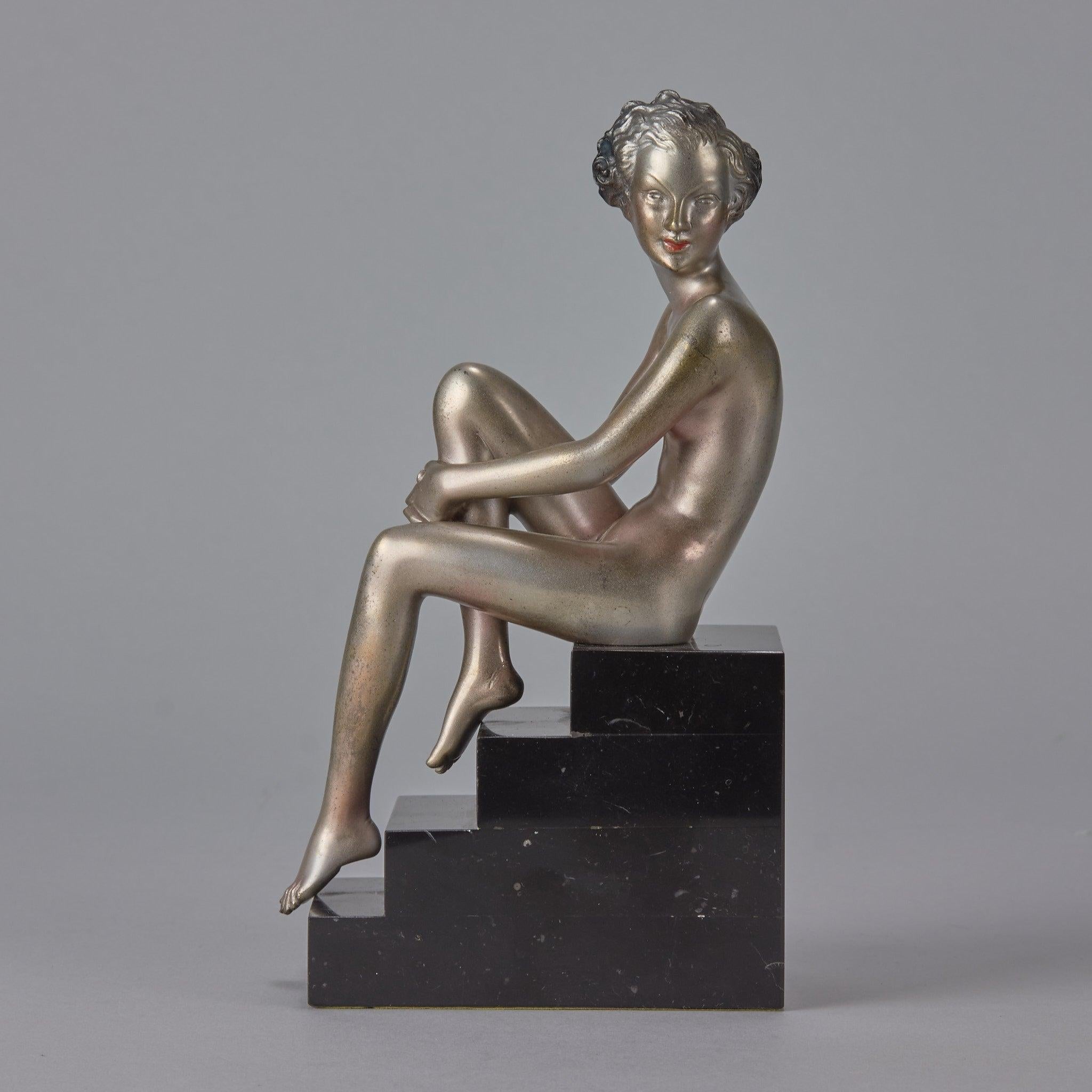 “Seated Beauty” Art Deco Cold Painted Bronze Sculpture by Josef Lorenzl - circa 1930.

An excellent early 20th Century Art Deco cold painted bronze figure of a naked beauty sat upon some steps clutching her leg. The surface with good colour and