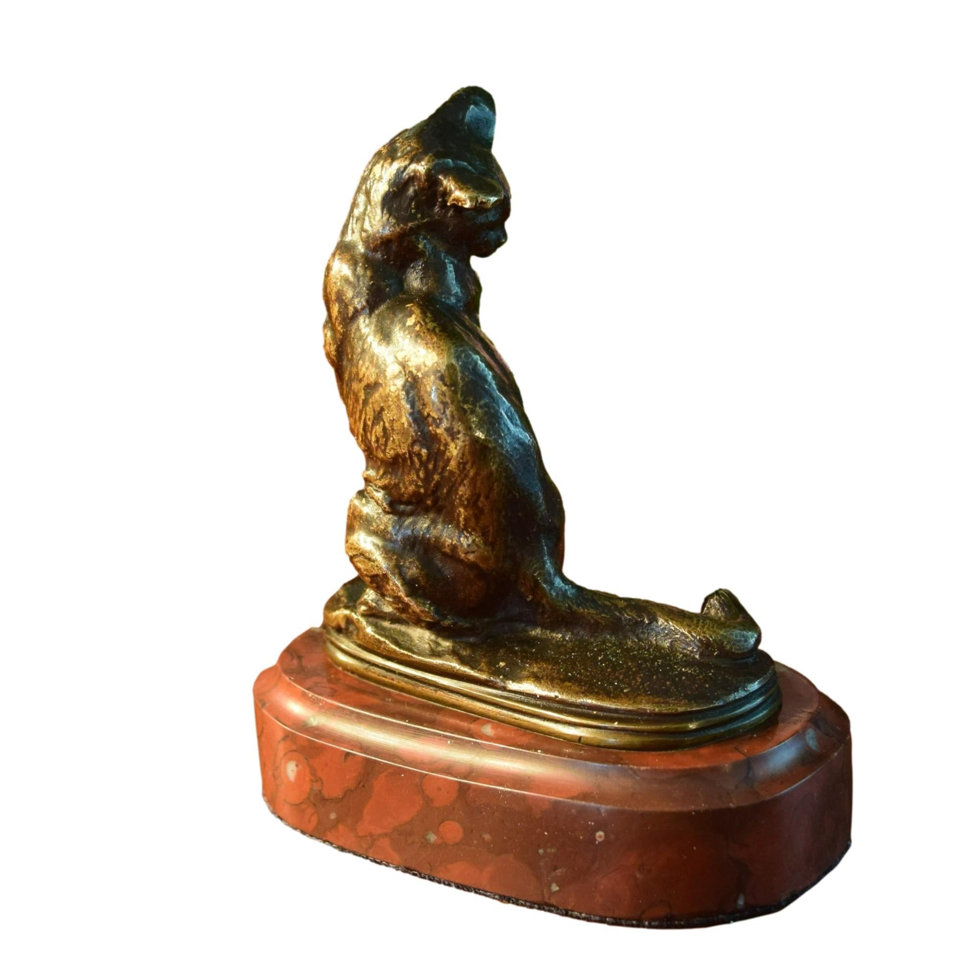 

Lovely Seated Bronze Cat Statue by Emmanuel Frémiet as French Sculptor French, born in 1824.
Highlighted by a brown patina the sculpture is charming, capturing perfectly the attitude of the little feline.

Frémiet was born in Paris, he was