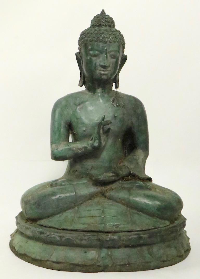 Seated verdigris bronze Tibetan Buddha figure, decorative garden statuary in excellent original condition. We believe this item is circa 1970s-1980s however, it is hard to date with specificity.
Please view the entire collection of garden statuary