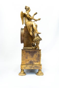 Seated Female Figure in French Fire-Gilt Clock from Empire Era