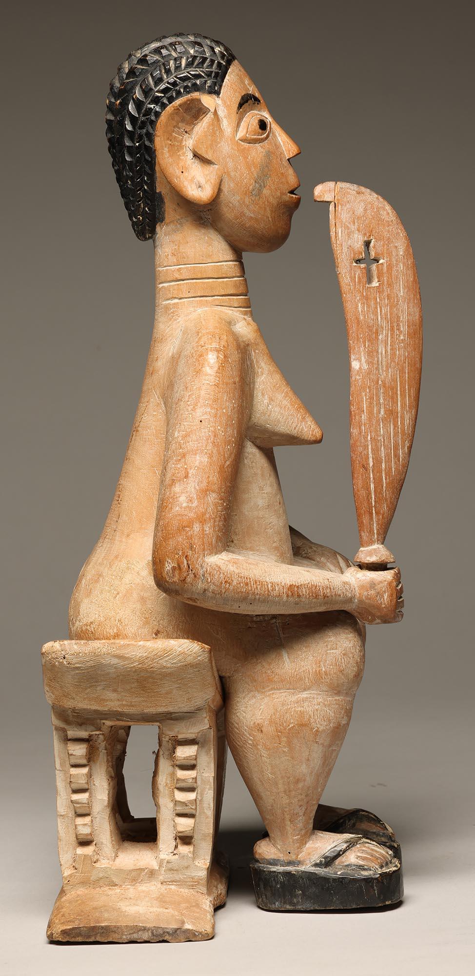 Tribal Seated Female Figure on Stool Holding a Sword Ewe Ghana, West Africa ex Willis For Sale
