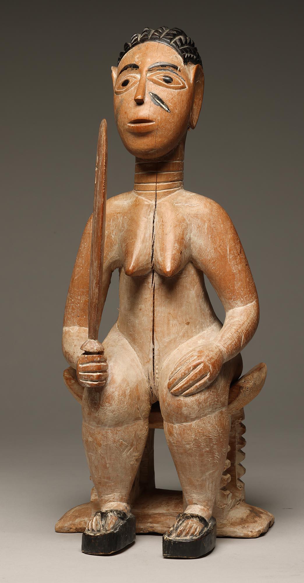 Seated Female Figure on Stool Holding a Sword Ewe Ghana, West Africa ex Willis In Fair Condition For Sale In Point Richmond, CA