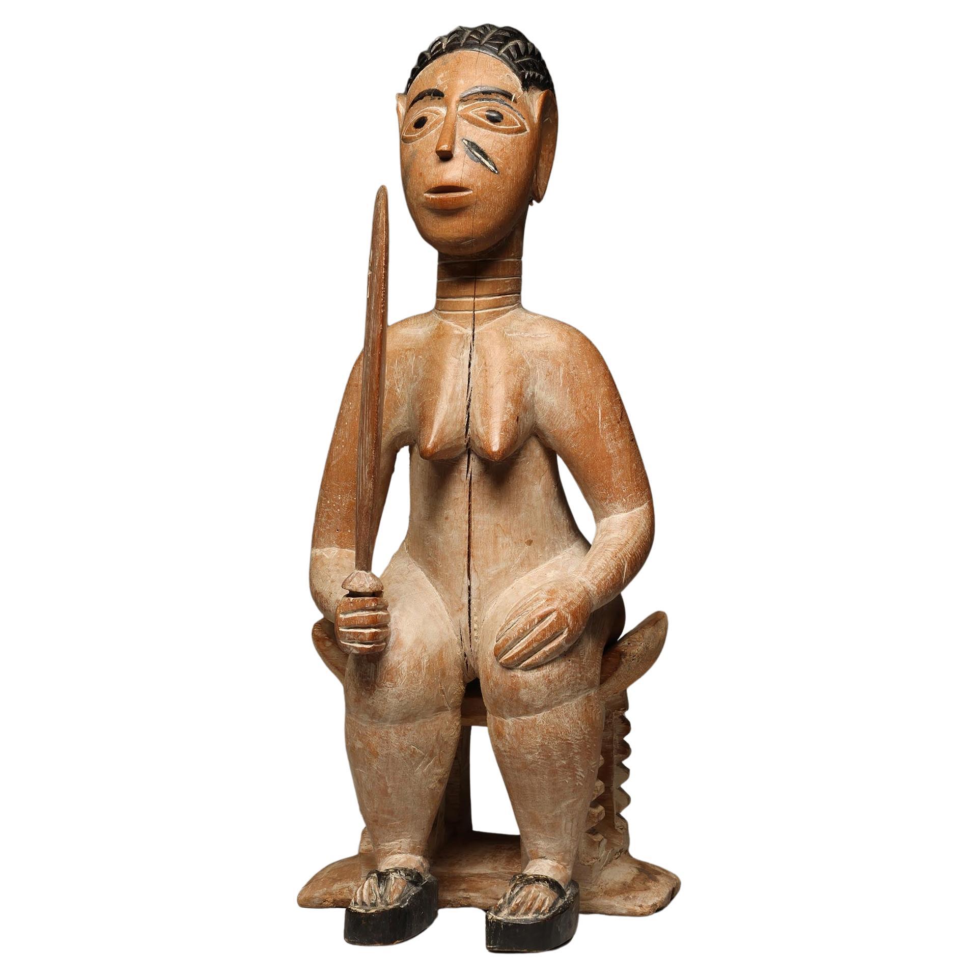 Seated Female Figure on Stool Holding a Sword Ewe Ghana, West Africa ex Willis For Sale