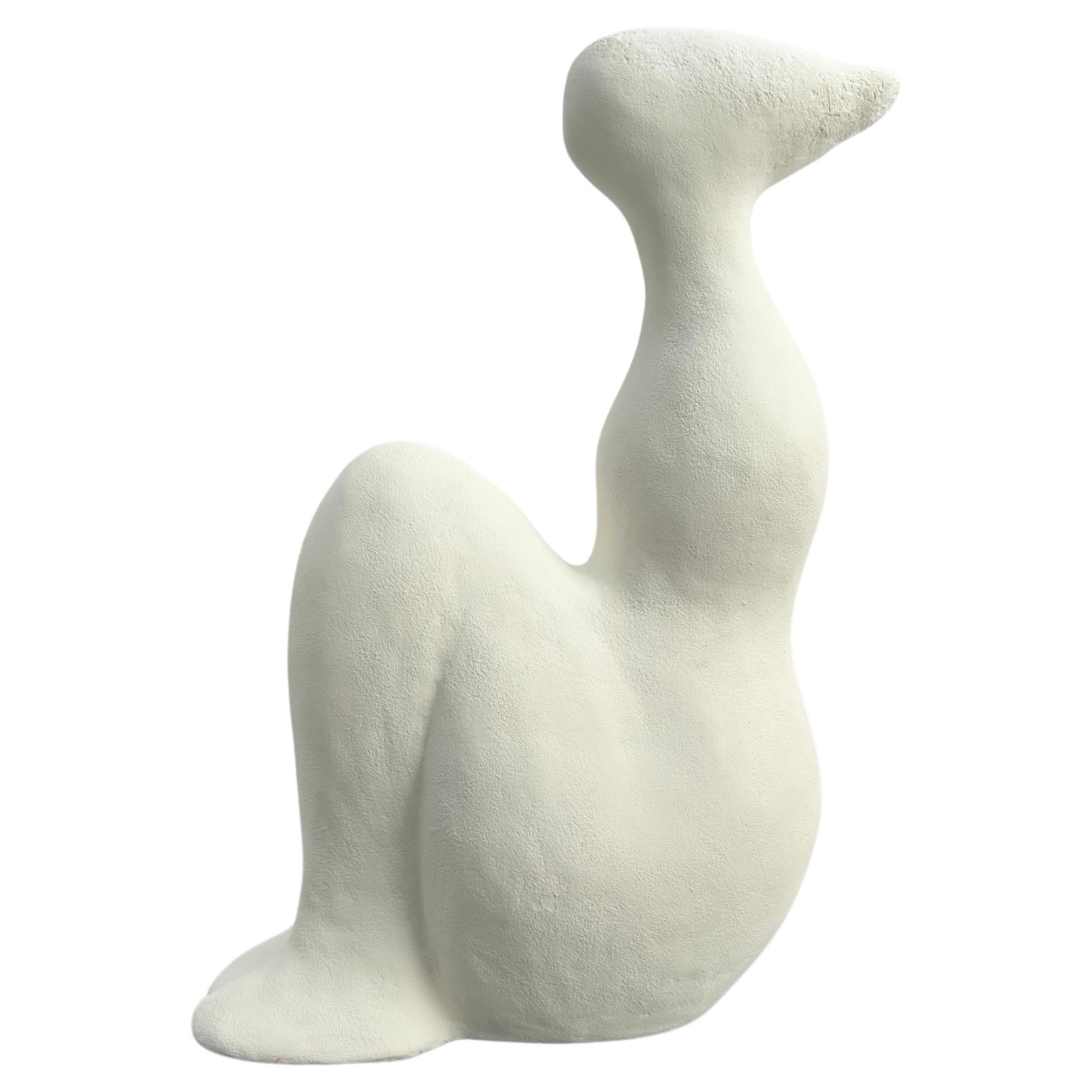 Seated figure white abstract sculpture