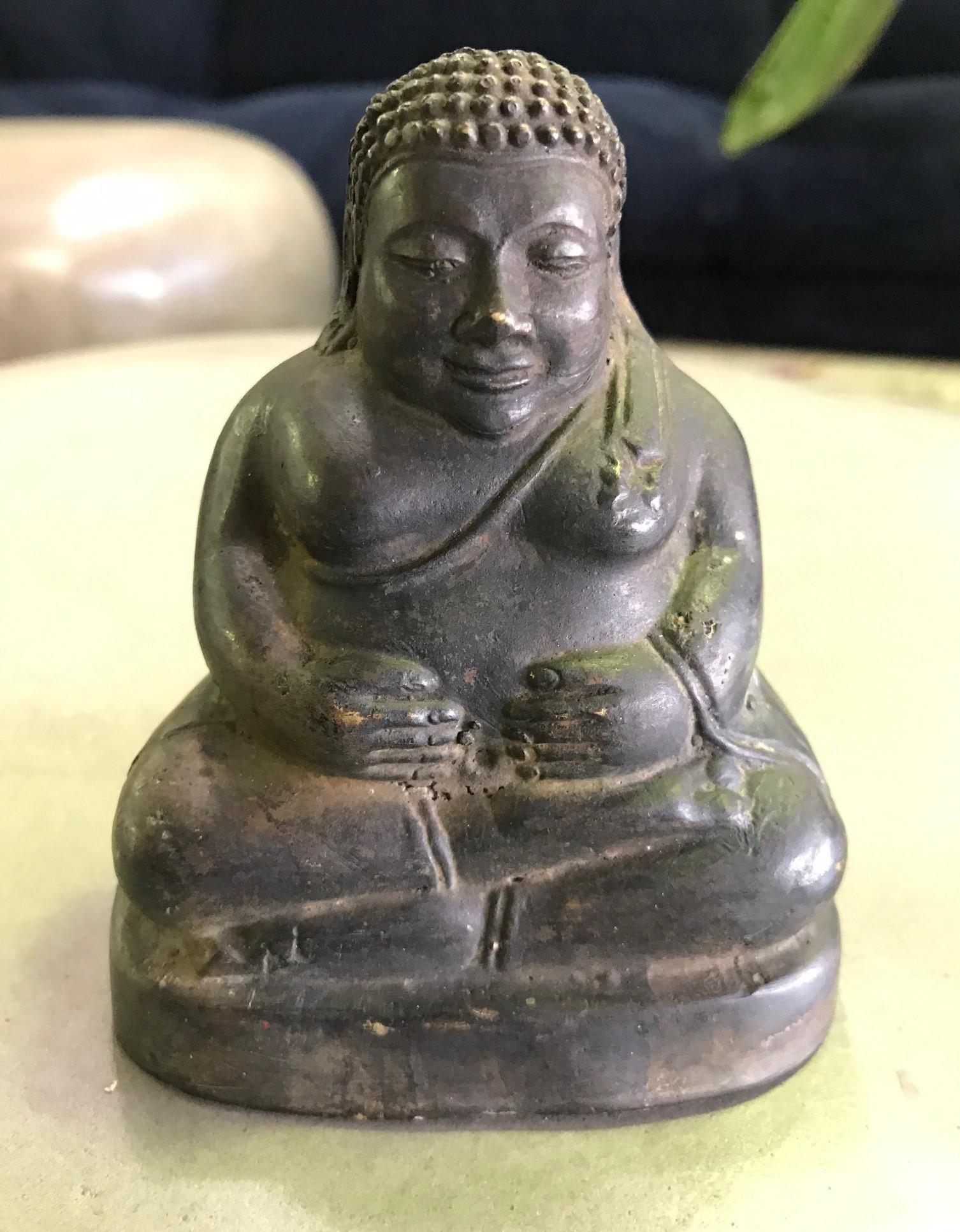 A wonderful, gem of a piece. The piece has a beautiful feel and heft to it. The laughing or jolly Buddha is known in China as Budai or Putai, Bodai in Vietnamese, and Hotei in Japanese, and are best known for their cheerful nature and good spirits.