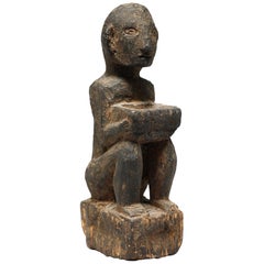 Seated Philippine Miniature Bulul Figure Holding Square Bowl Encrusted Surface