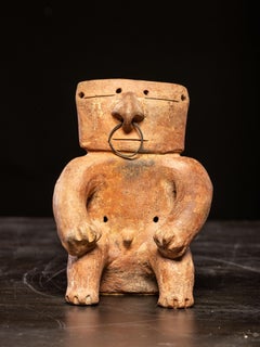 Ethnic Design-Seated terracotta Figure with nose-ring, Quimbaya culture, 17th C