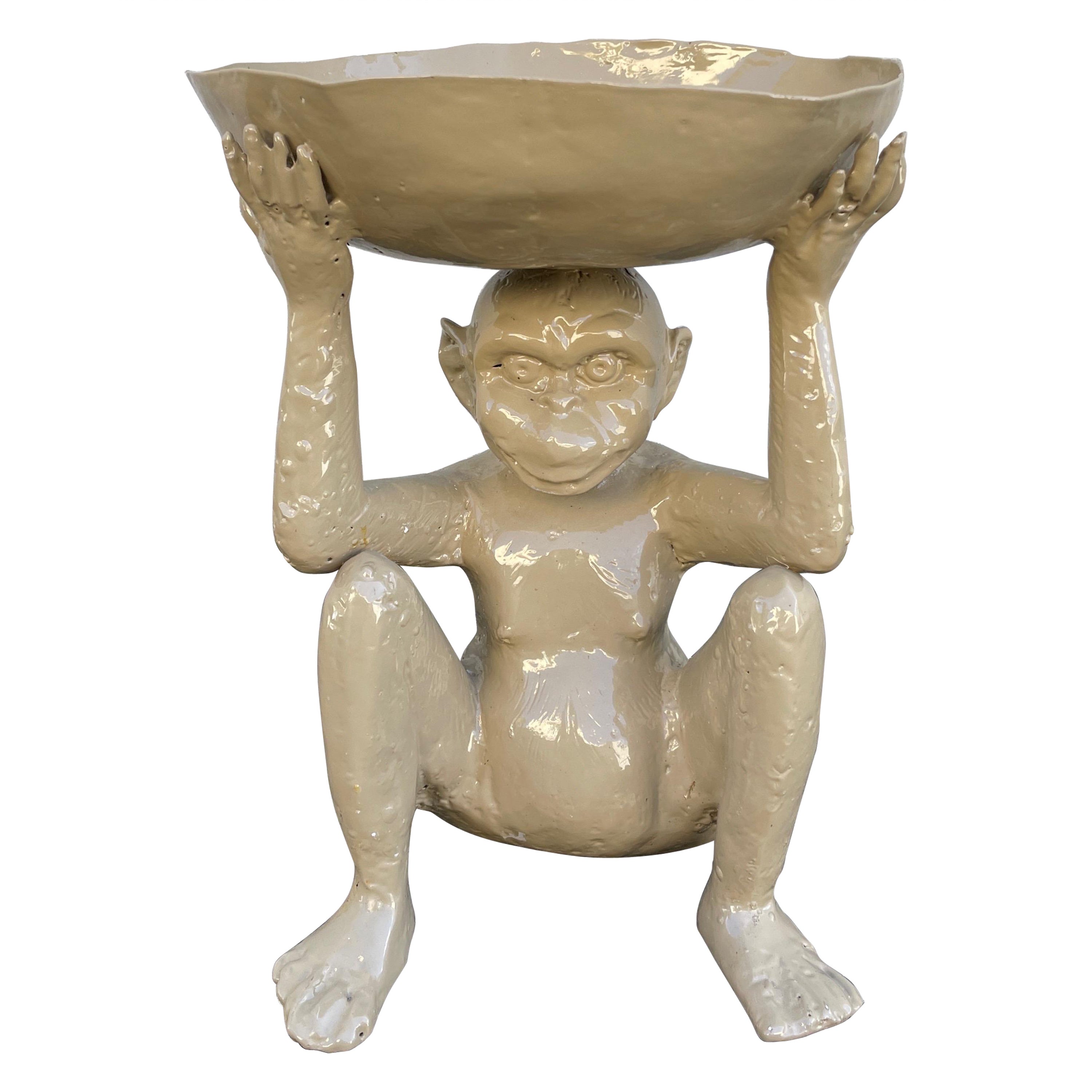 Seated Tole Monkey Holding a Bowl on His Head