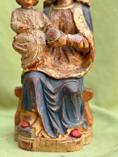 Seated Virgin and Child, both crowned, polychrome wood carving, Spanish school