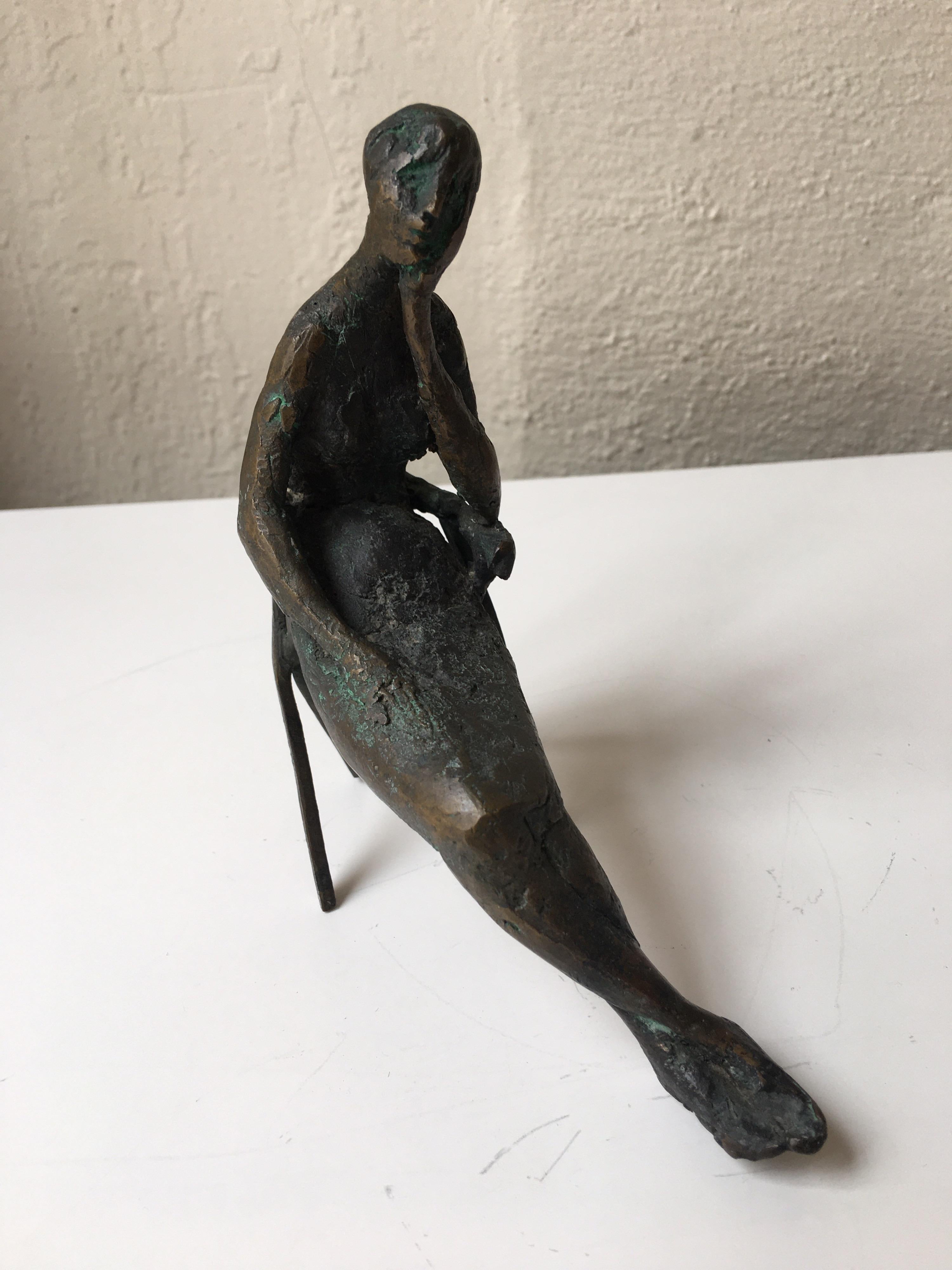 Small seated woman bronze by artist Laura Ziegler, 1956. In very nice condition, ready to find that special spot!