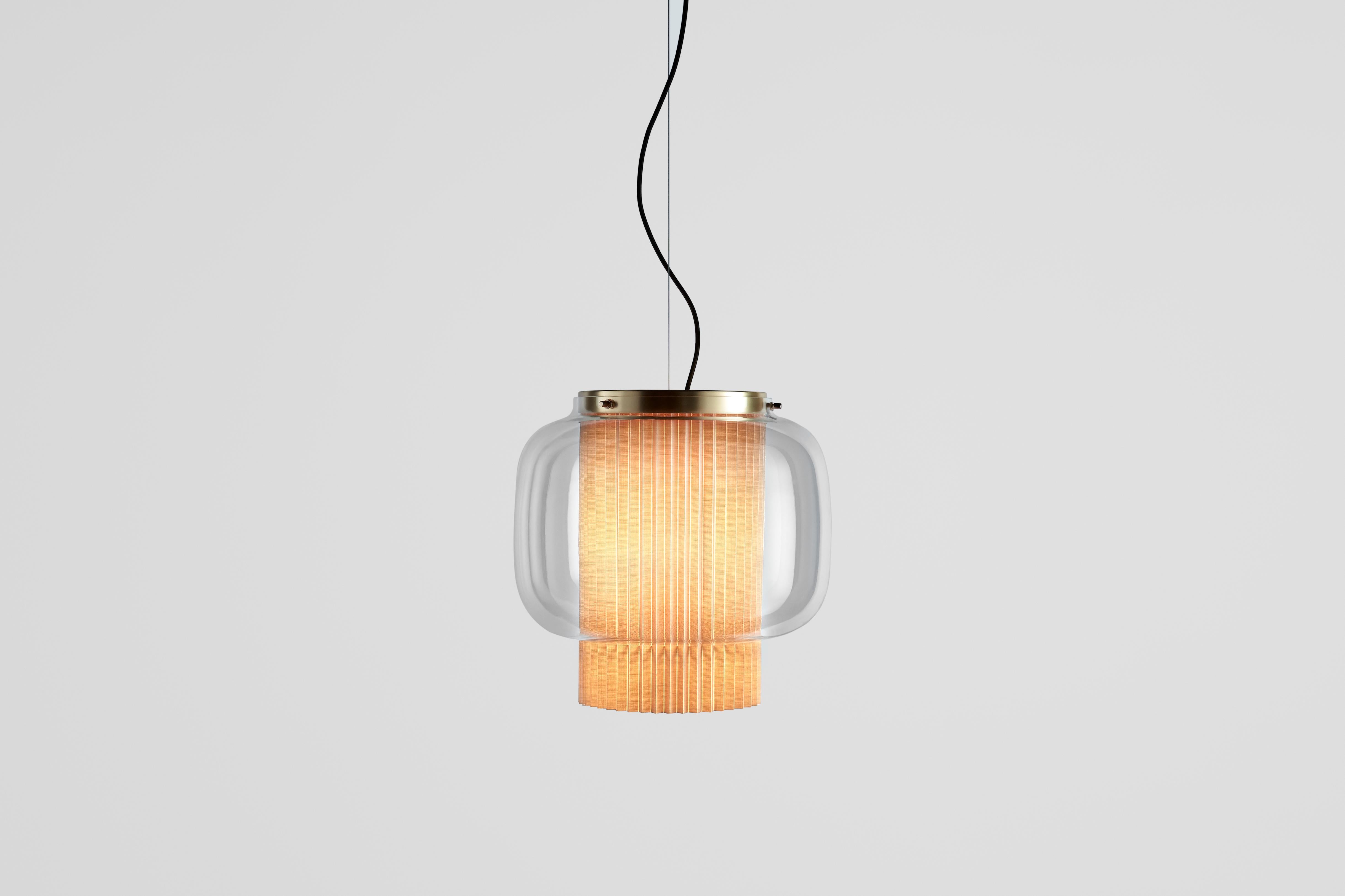 Manila T GR by Sebastian Herkner


An incredibly elegant combination of artisanal blown glass and a plissé textile diffuser. Its name comes from Spanish 
