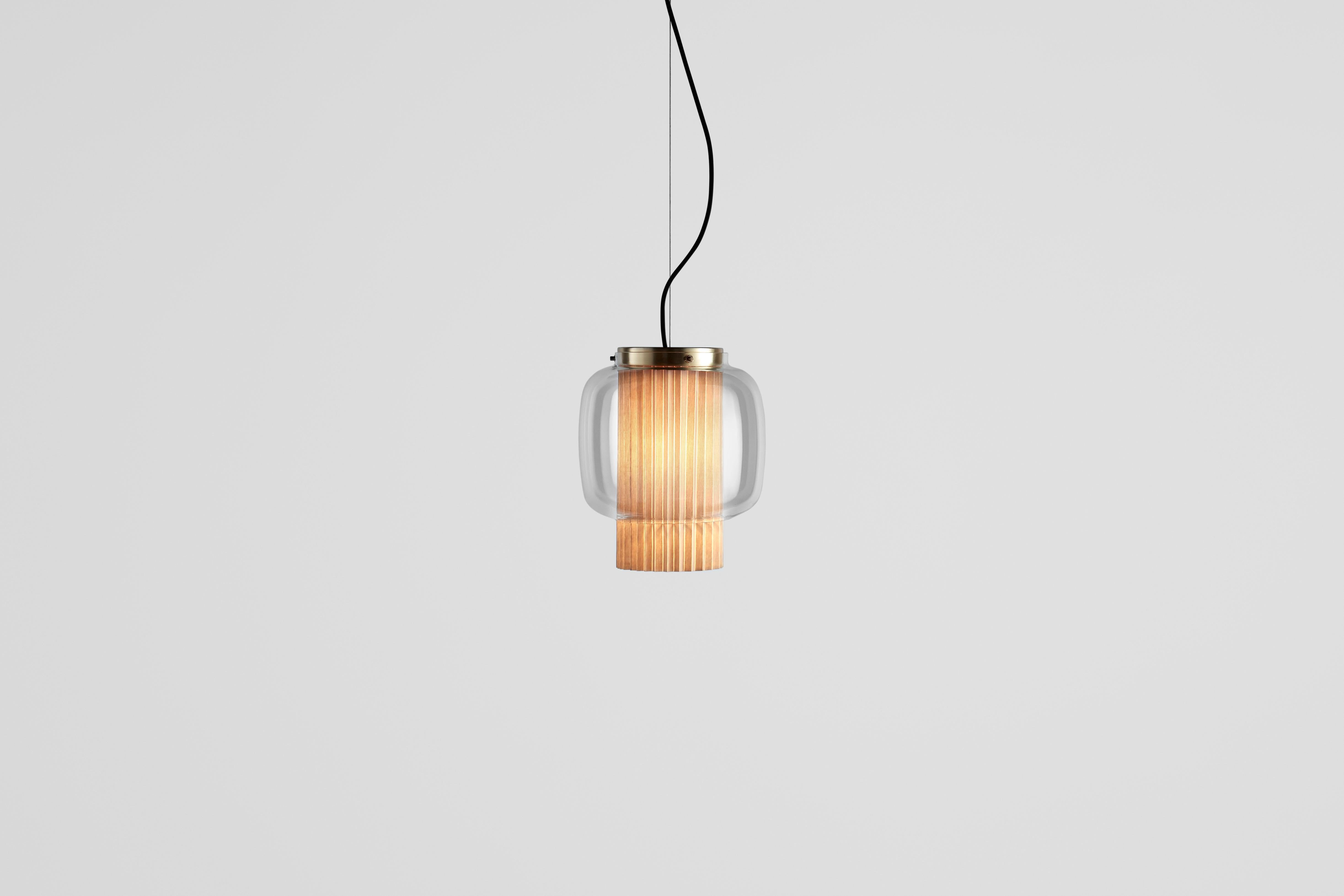 Manila T PE by Sebastian Herkner
An incredibly elegant combination of artisanal blown glass and a plissé textile diffuser. Its name comes from Spanish 