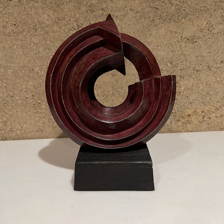 Postmodern Sculpture by Sebastian aka Enrique Carbajal González from Mexico.
Abstract Sculpture is signed and numbered SEBASTIAN 2003 160/750.
Patinated bronze, red patina mounted on new base of teak wood.
8 tall x 6.5 w x 4 d
Wear is consistent
