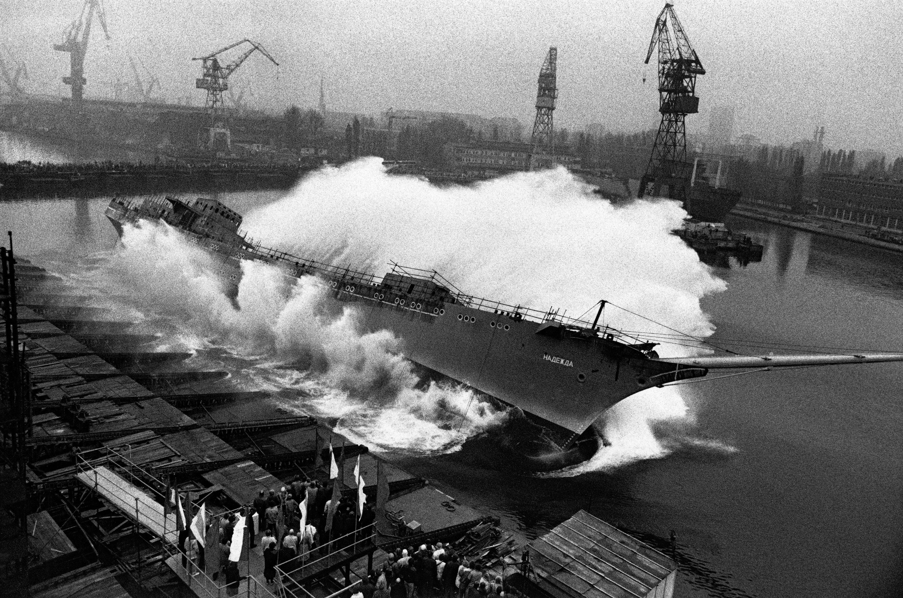 Sebastião Salgado Black and White Photograph - A ship is launched. Shipyards of Gdansk. Poland