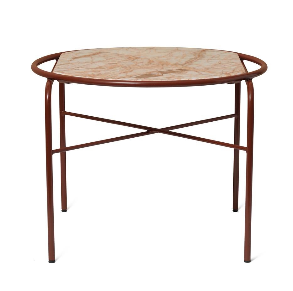 Secant round table soft rose marble oxide red by Warm Nordic
Dimensions: D60 x H45 cm
Material: Marble, Powder coated steel
Weight: 10.5 kg
Also available in different finishes and dimensions. 

Elegant coffee table that combines a sculptural