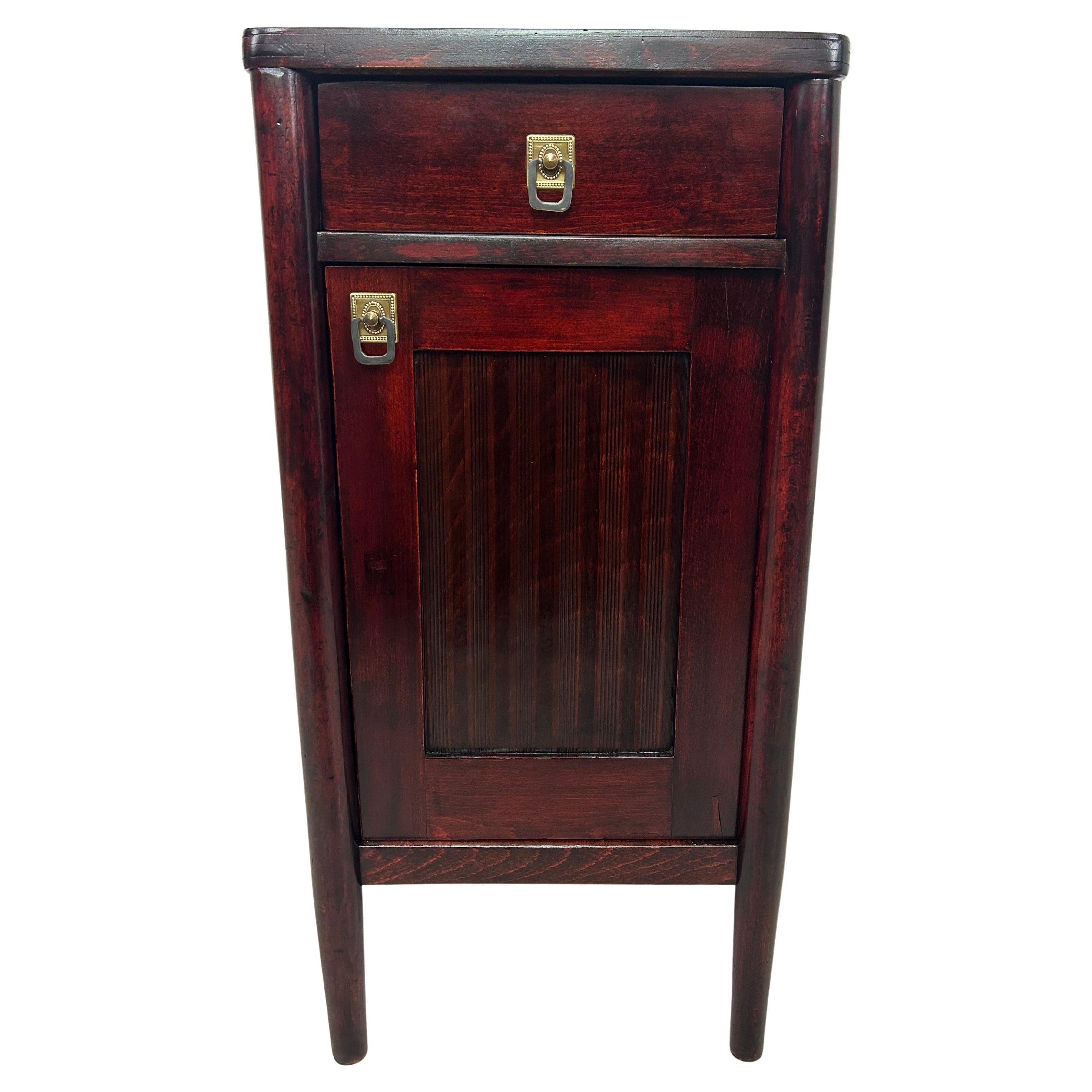 Secession bedside table by J&J Kohn