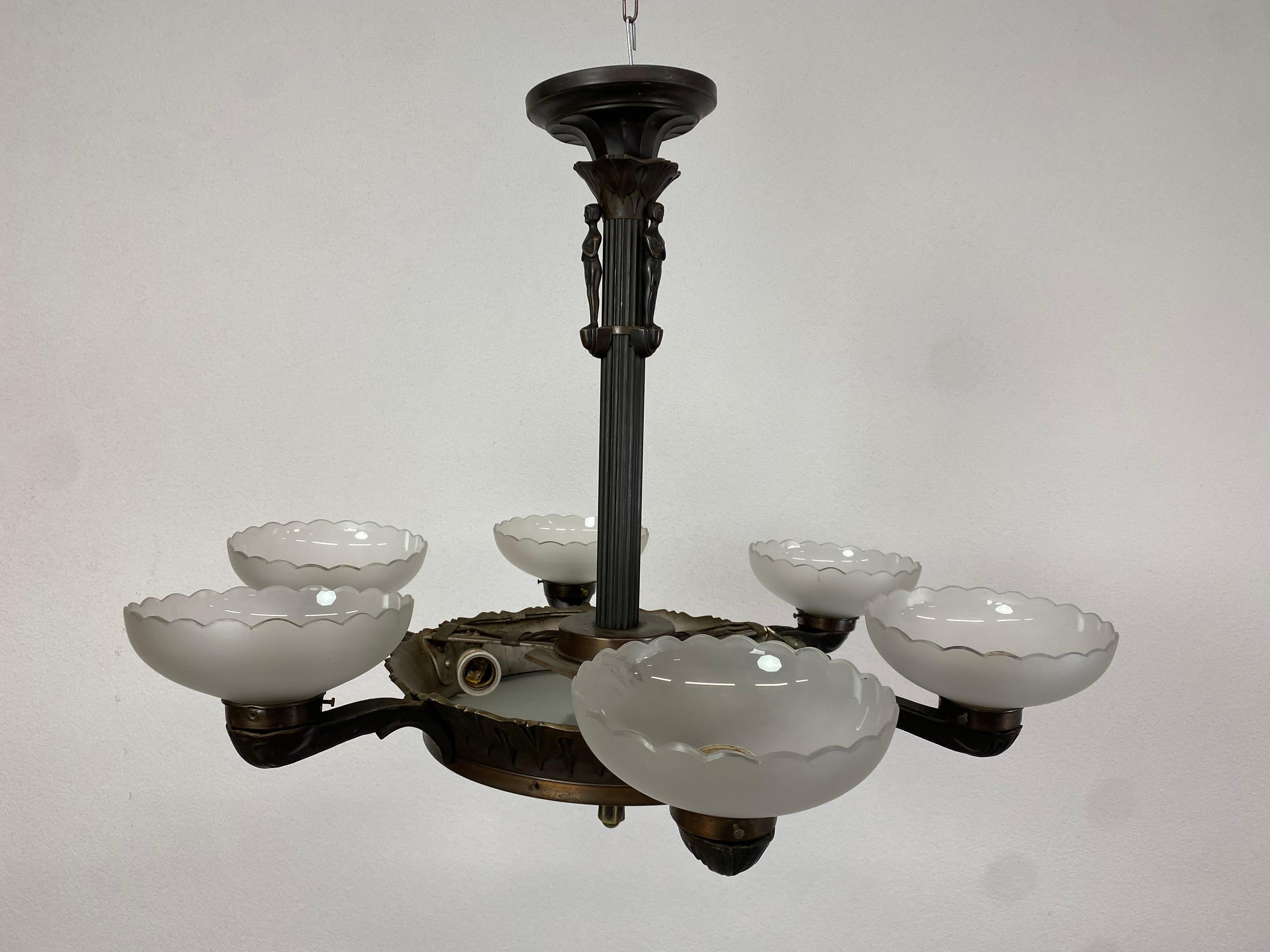 Secession bronze chandelier with figural motif. 
