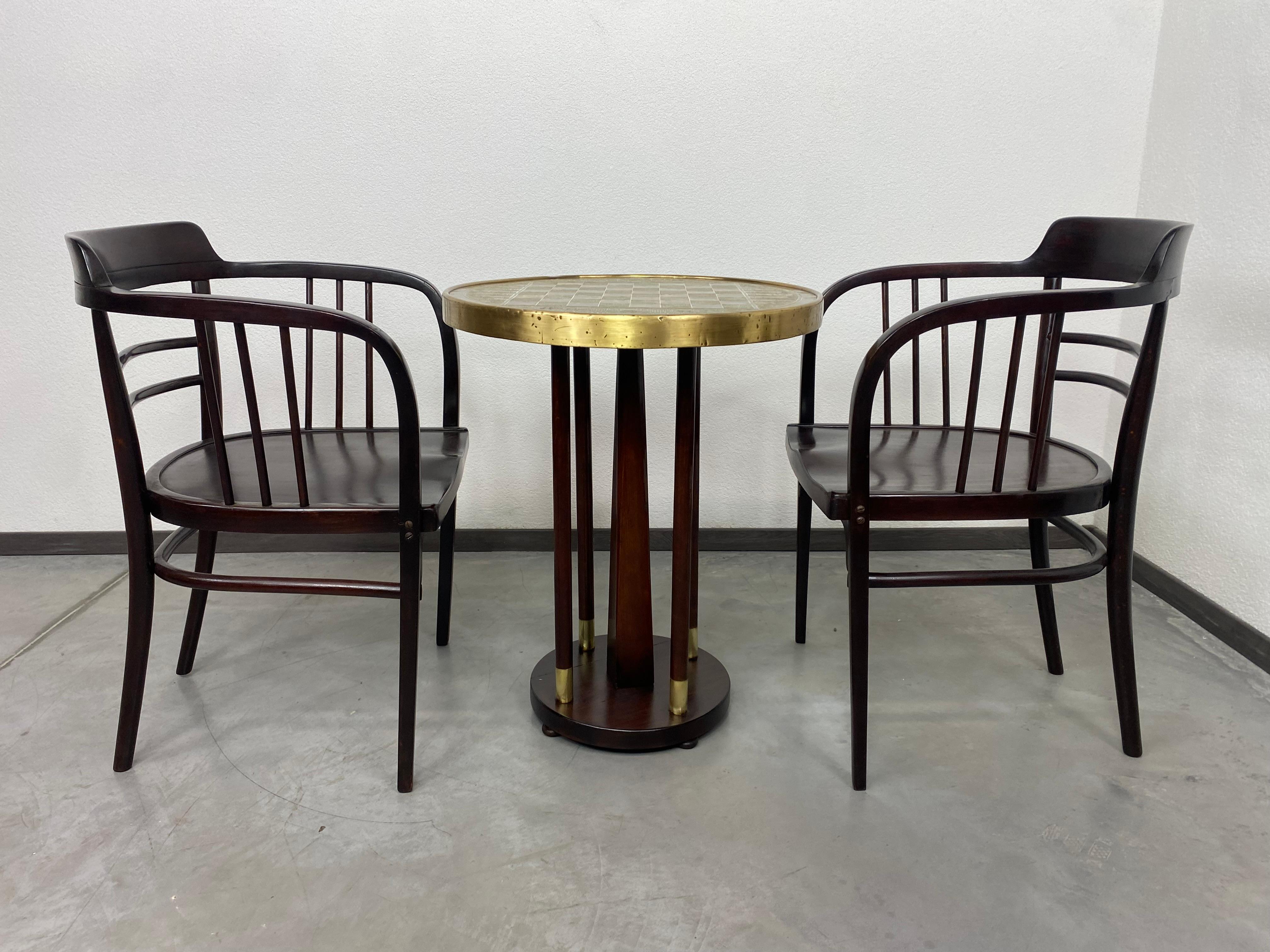 Secession chess table with hammered brass top, professionally stained and repolished.