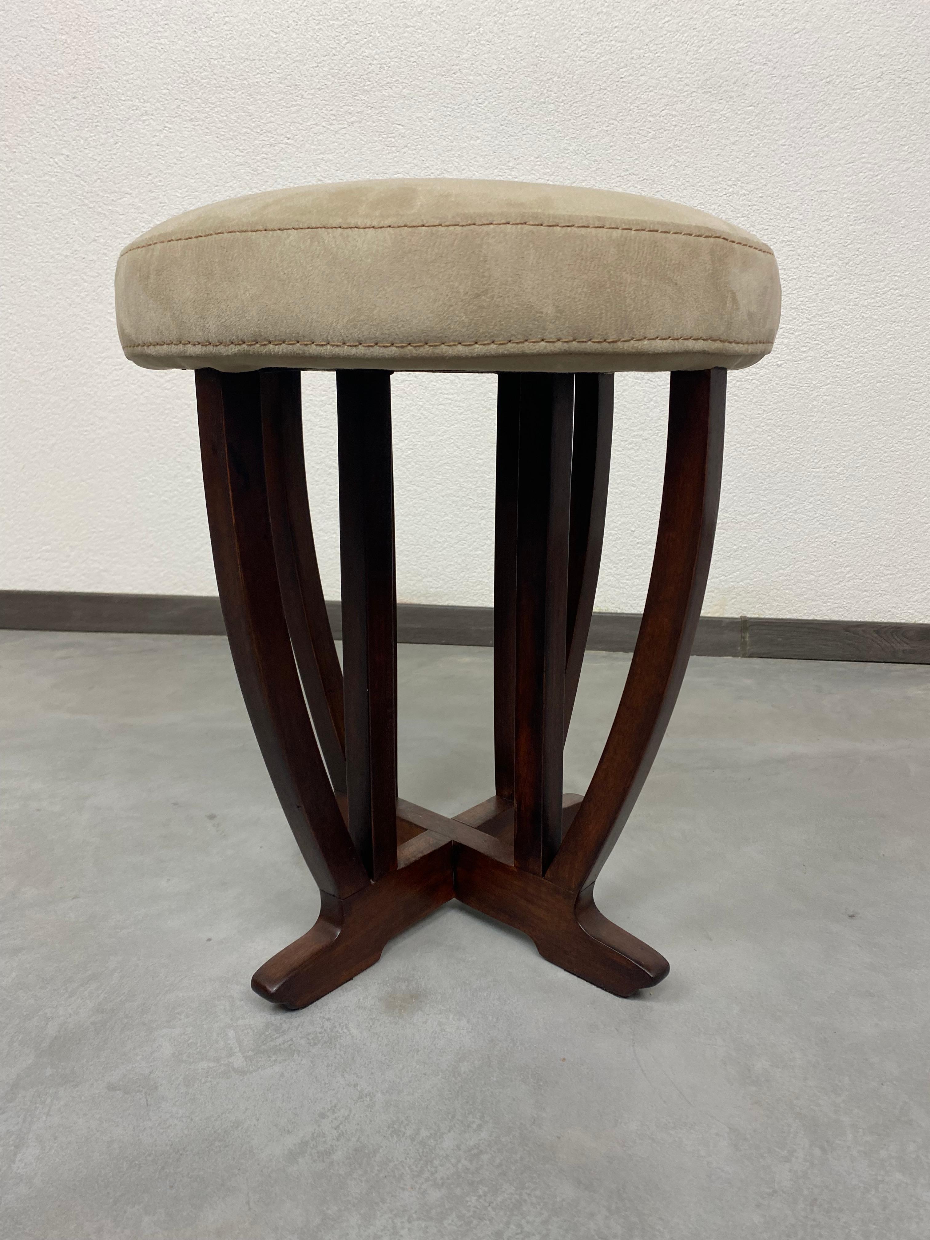 Secession stool professionally stained and repolished.