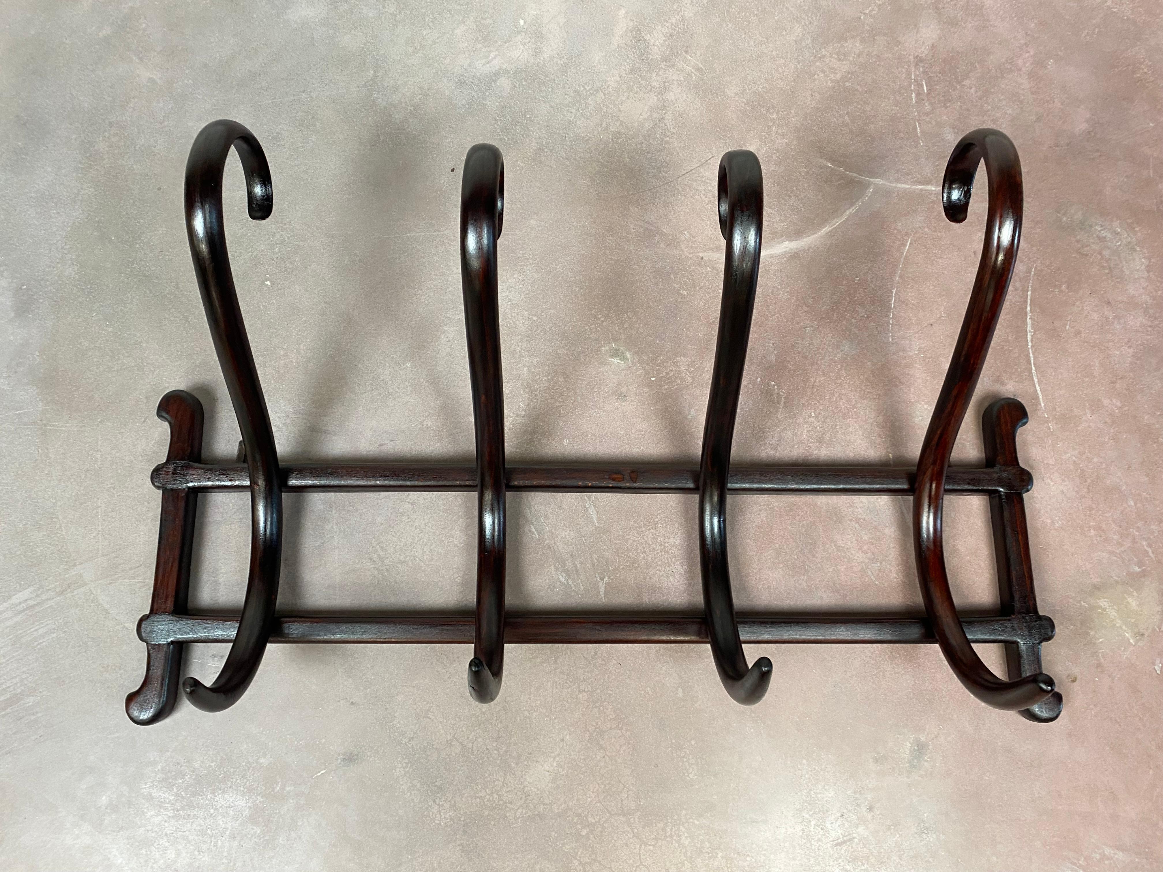 Secession wall hanger no.1 by Thonet professionally stained and repolished.