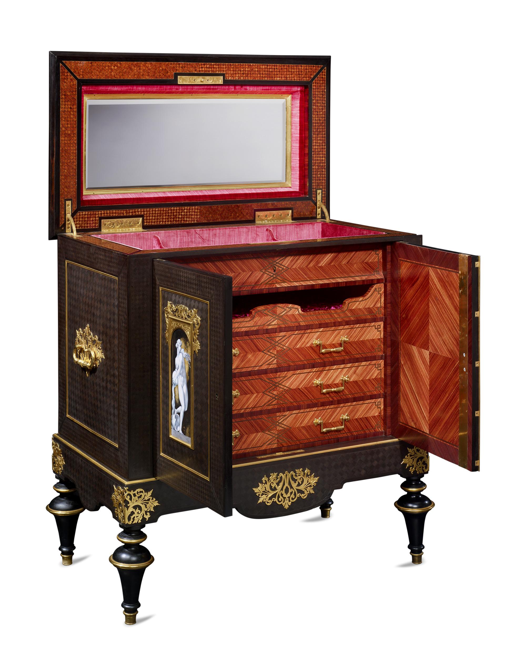 This exceptional and remarkably large jewelry cabinet by celebrated Parisian ébéniste Alphonse Giroux was created during the height of the Second Empire when the style of Napoleon III reached its highest level of expression and elegance. The