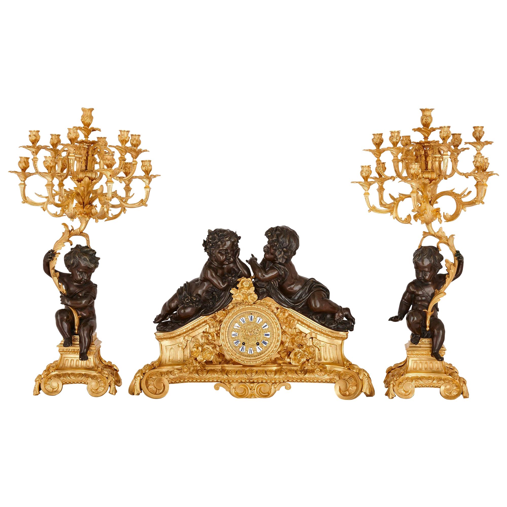 Second Empire Period Patinated and Gilt Bronze Three-Piece Clock Set