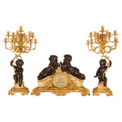 Antique Second Empire Period Patinated and Gilt Bronze Three-Piece Clock Set