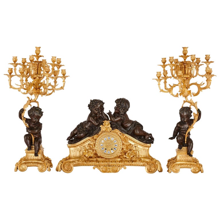 Second Empire Period Patinated and Gilt Bronze Three-Piece Clock Set For Sale