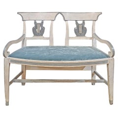 SECOND HALF OF THE 18th CENTURY SMALL PAINTED SOFA