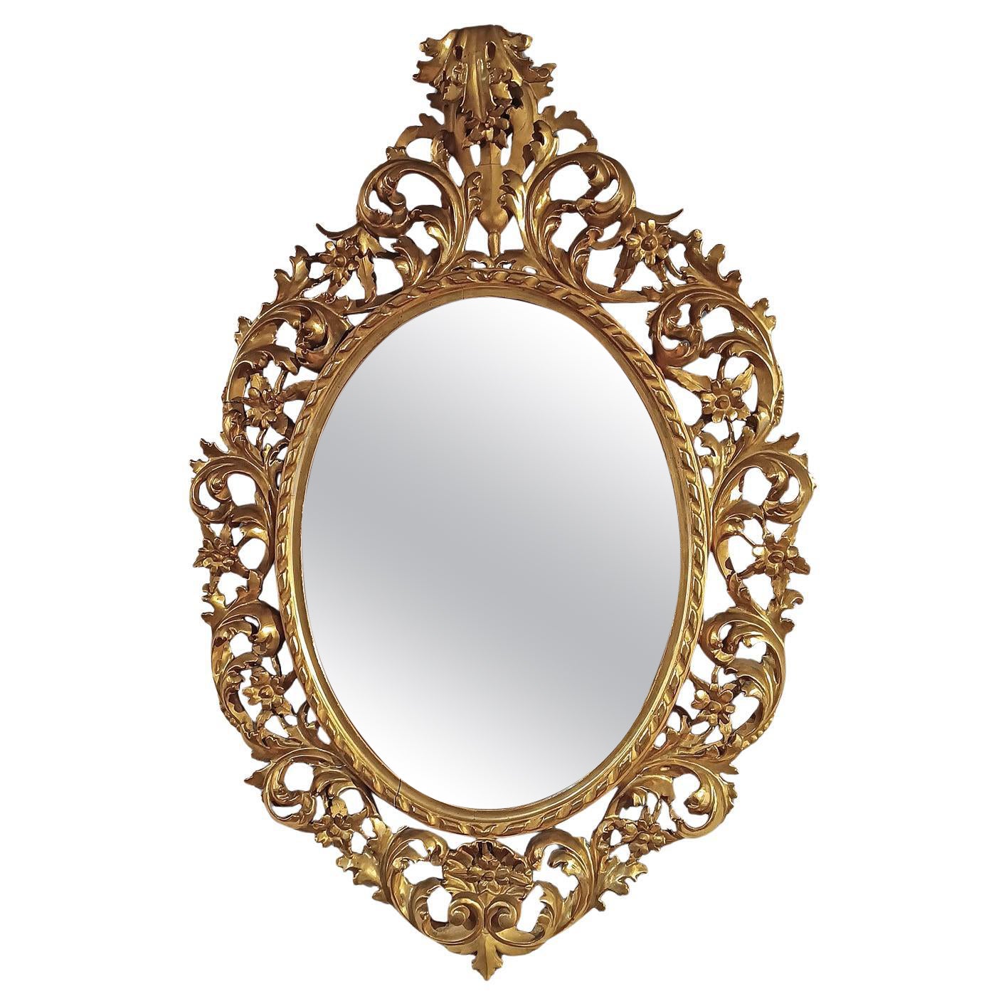 SPECCHIO OVALE DORATO DELLA SECONDA METÀ DEL XIX SECOLO in vendita