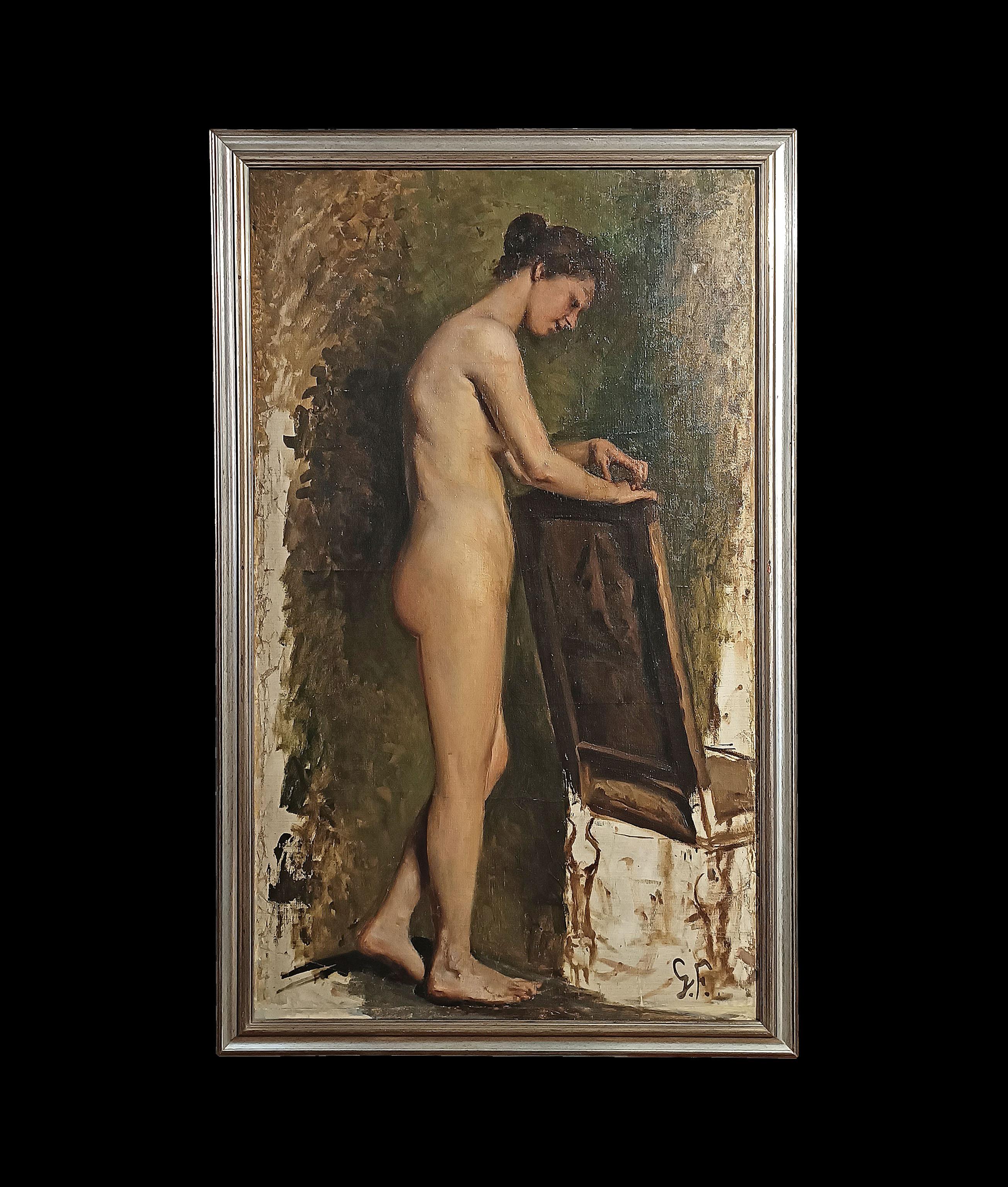 Elegante óleo sobre lienzo, adornado con un marco de madera tallada y plateada. El cuadro representa un estudio de un desnudo femenino, un dibujo típico de la Academia de Bellas Artes. La mujer, vista de perfil, tiene el pelo recogido y los brazos